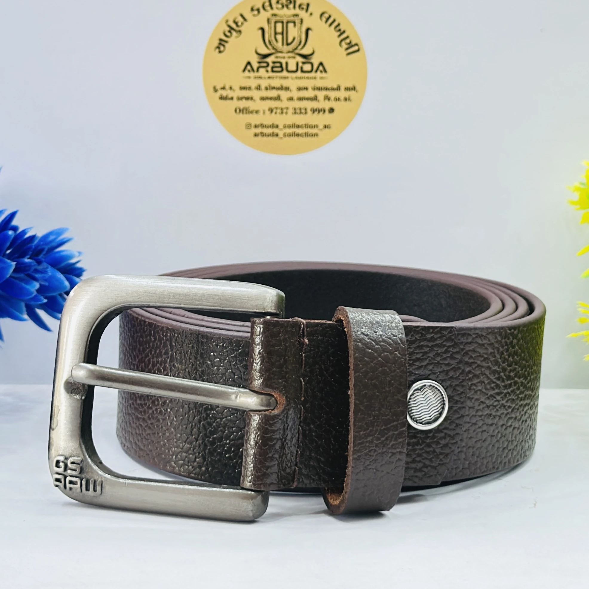 Based on similar products, this is a men's brown leather casual belt.
