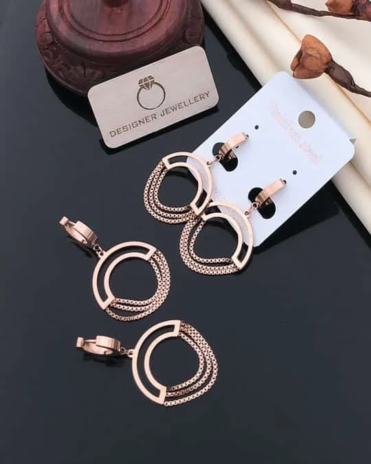 Gold plated chained circle drop earrings.