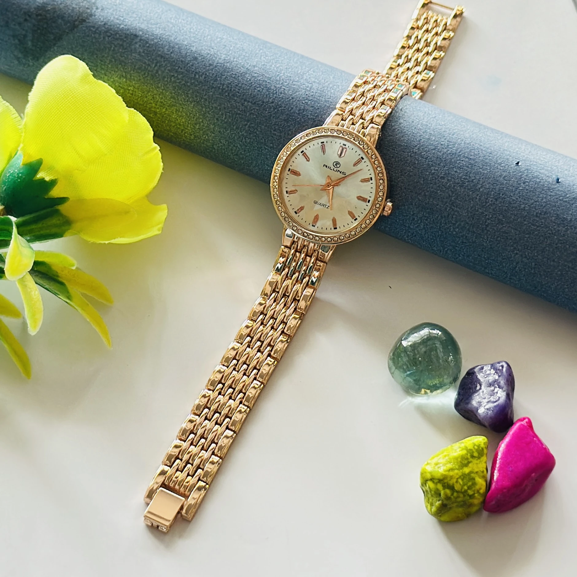 gold-toned Promise brand quartz women's watch