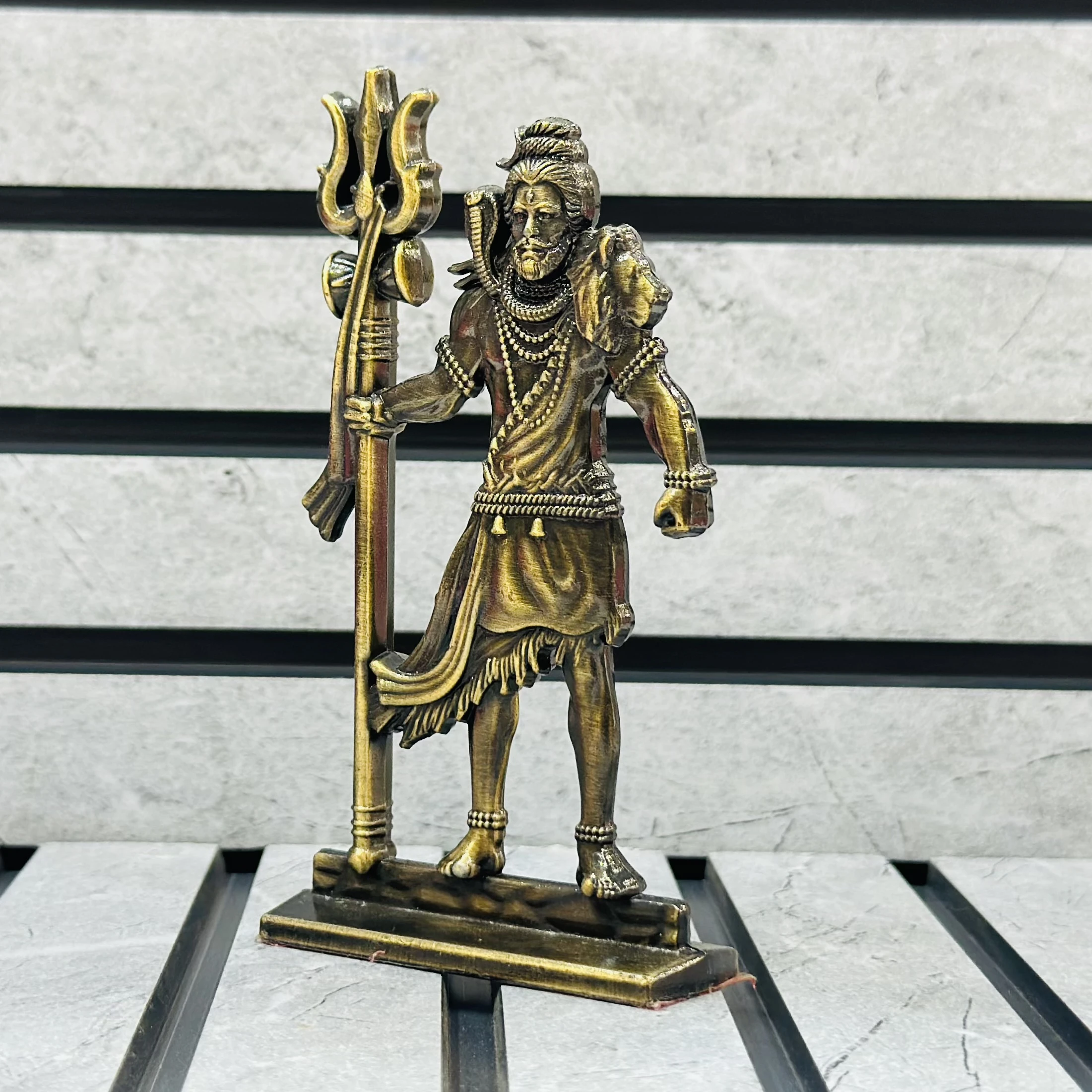 brass statue of the Hindu deity Lord Shiva.