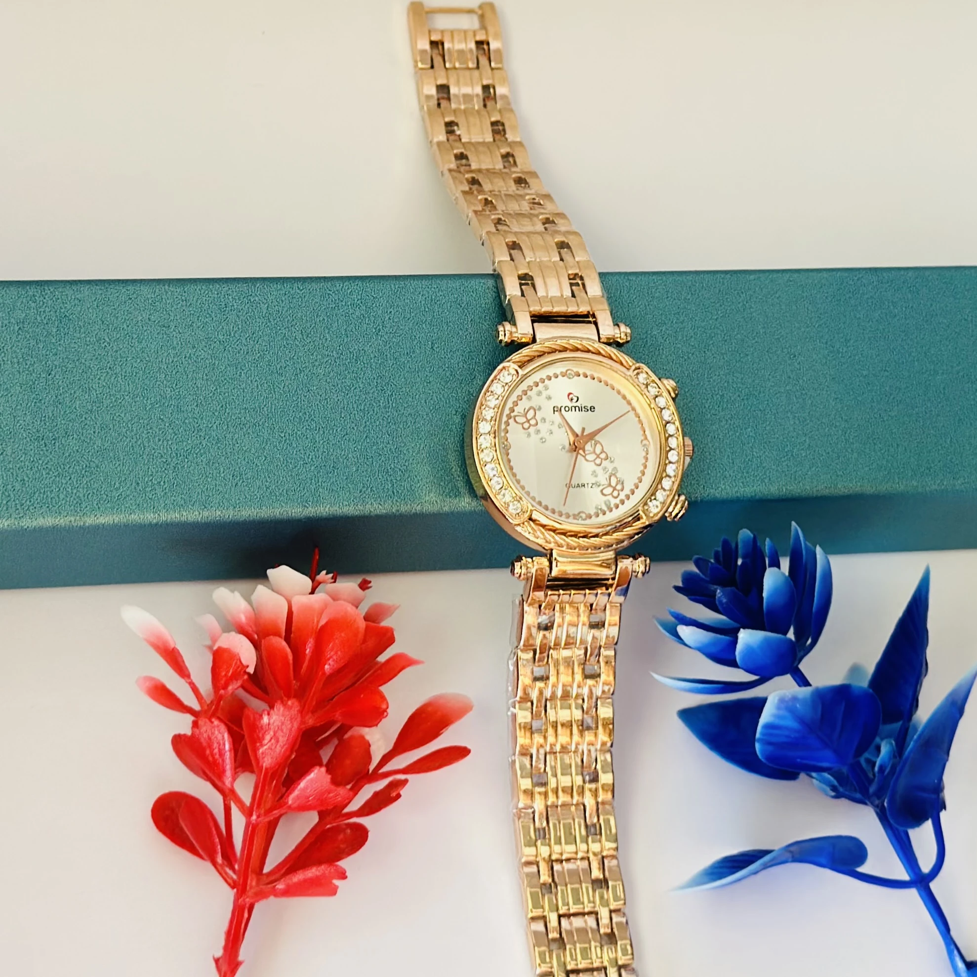 Promise Quartz watch with a rose gold-tone stainless steel bracelet