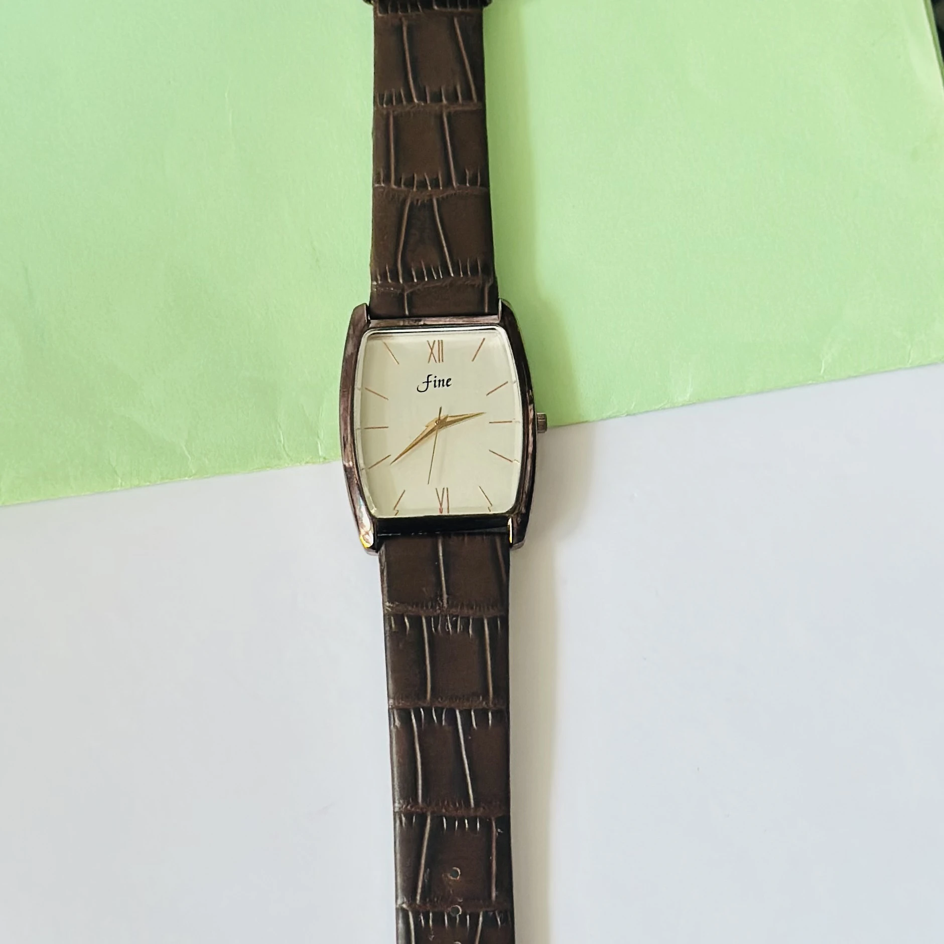 Edge analog watch for men with a white rectangular dial and a brown leather strap.