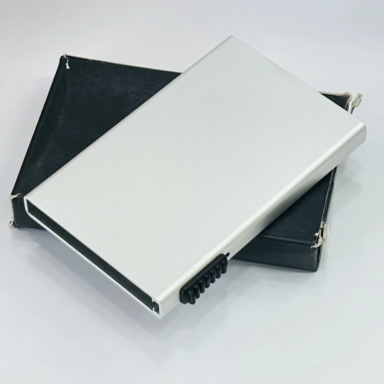 credit card holder with a pop-up mechanism.