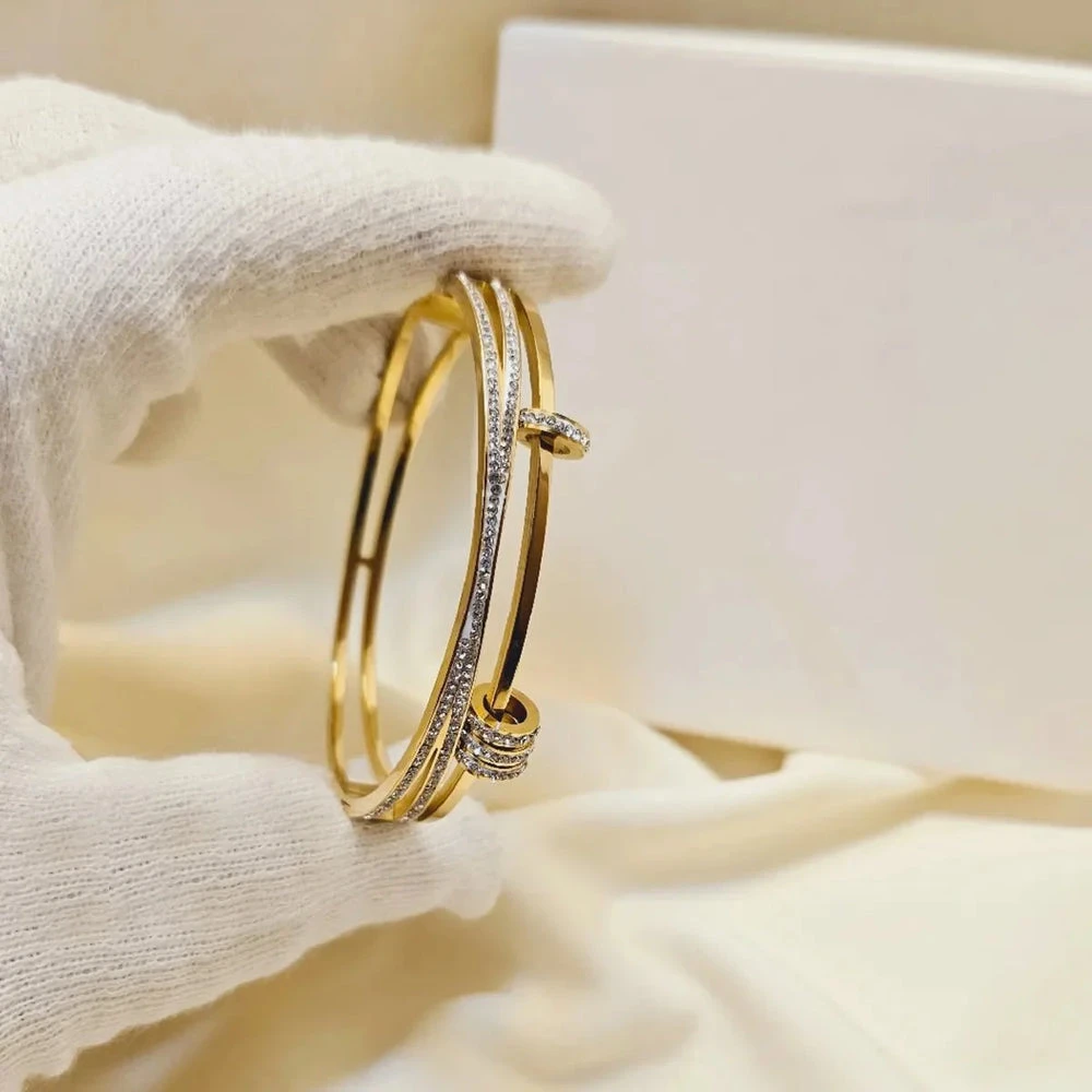 Gold toned multi-strand cuff bracelet