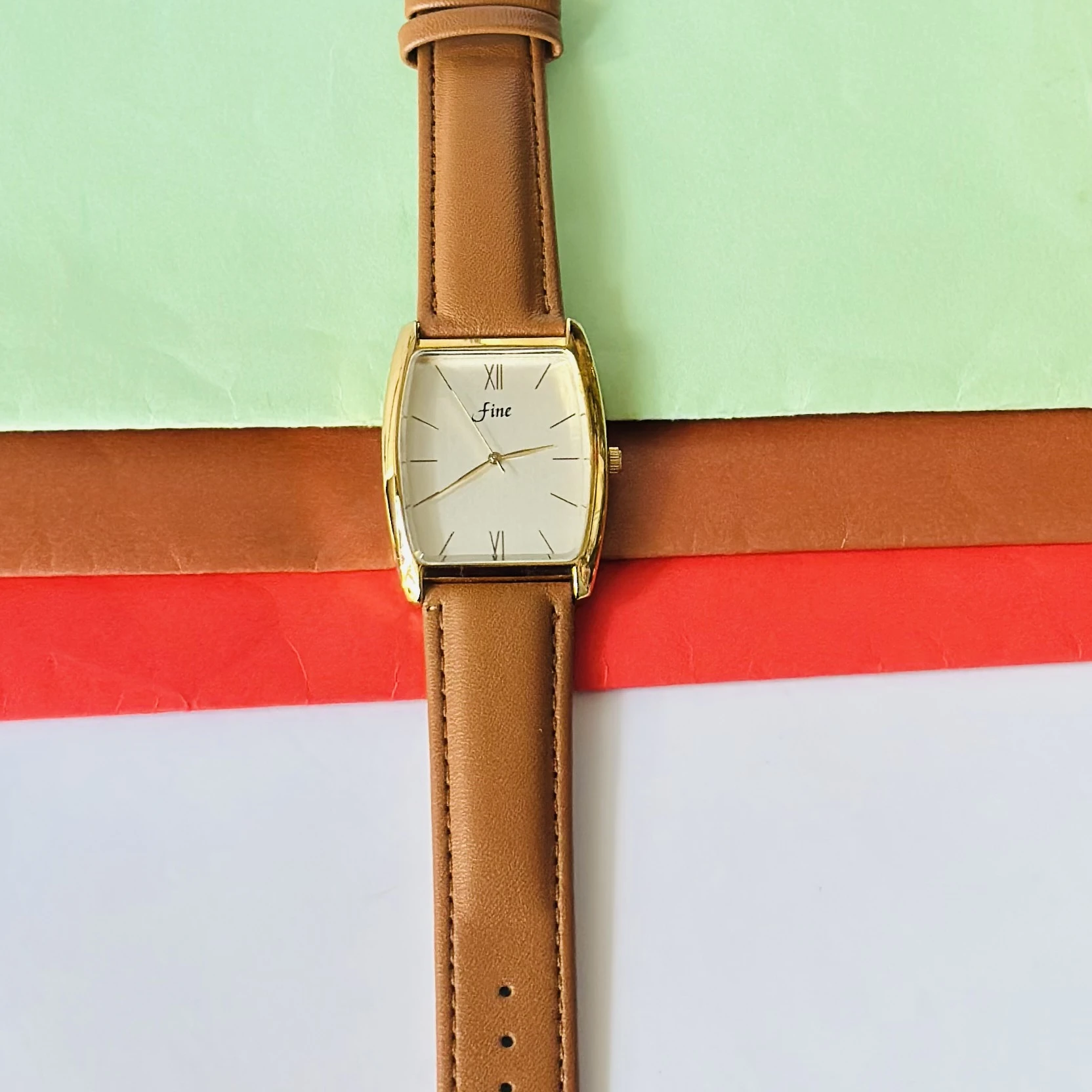 Edge Quartz Analog watch for men with a white dial and brown leather strap.