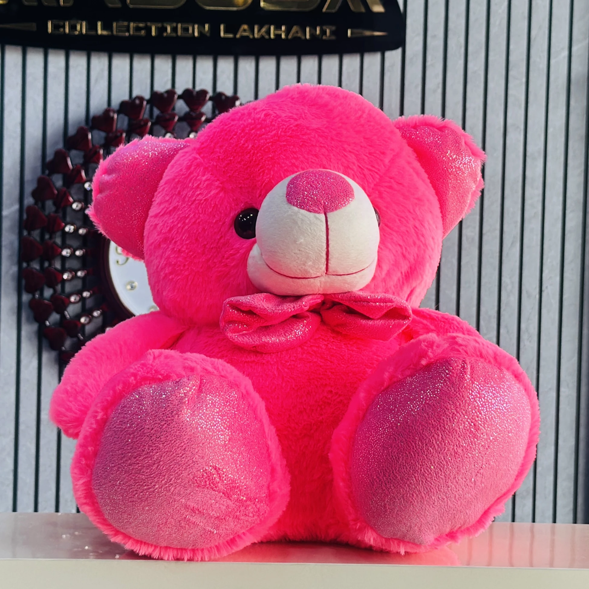 Bright pink plush teddy bear
