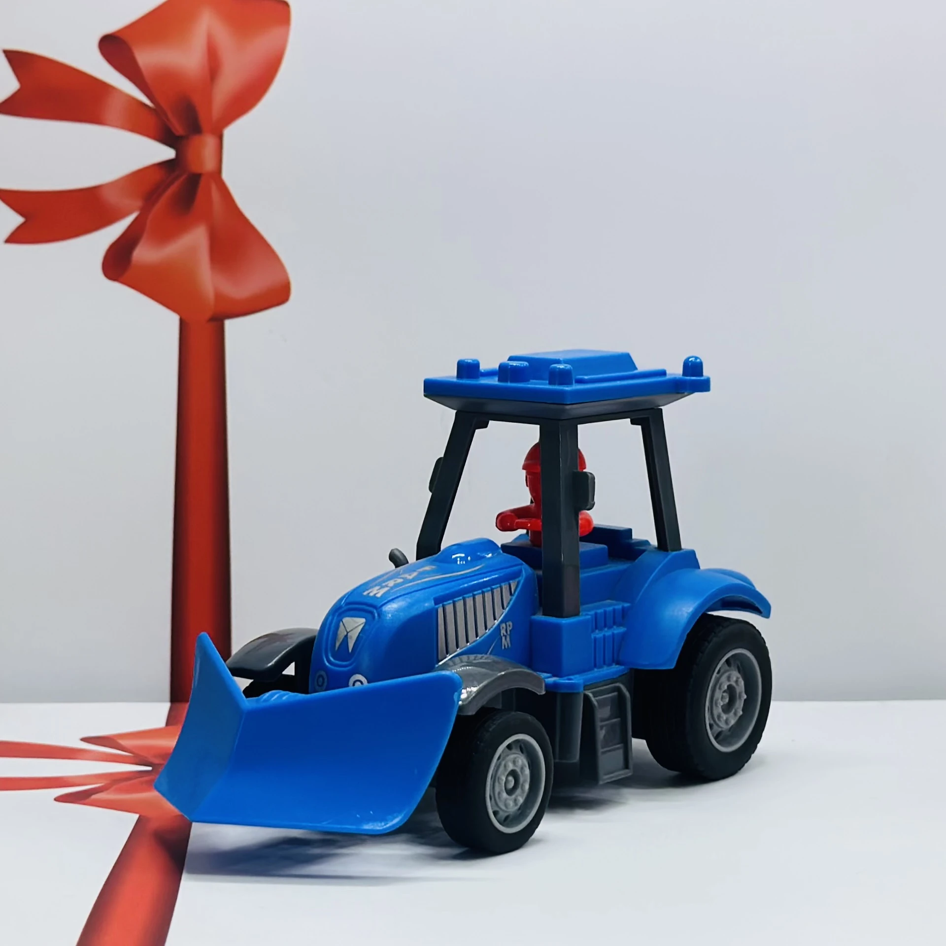 Blue plastic toy tractor