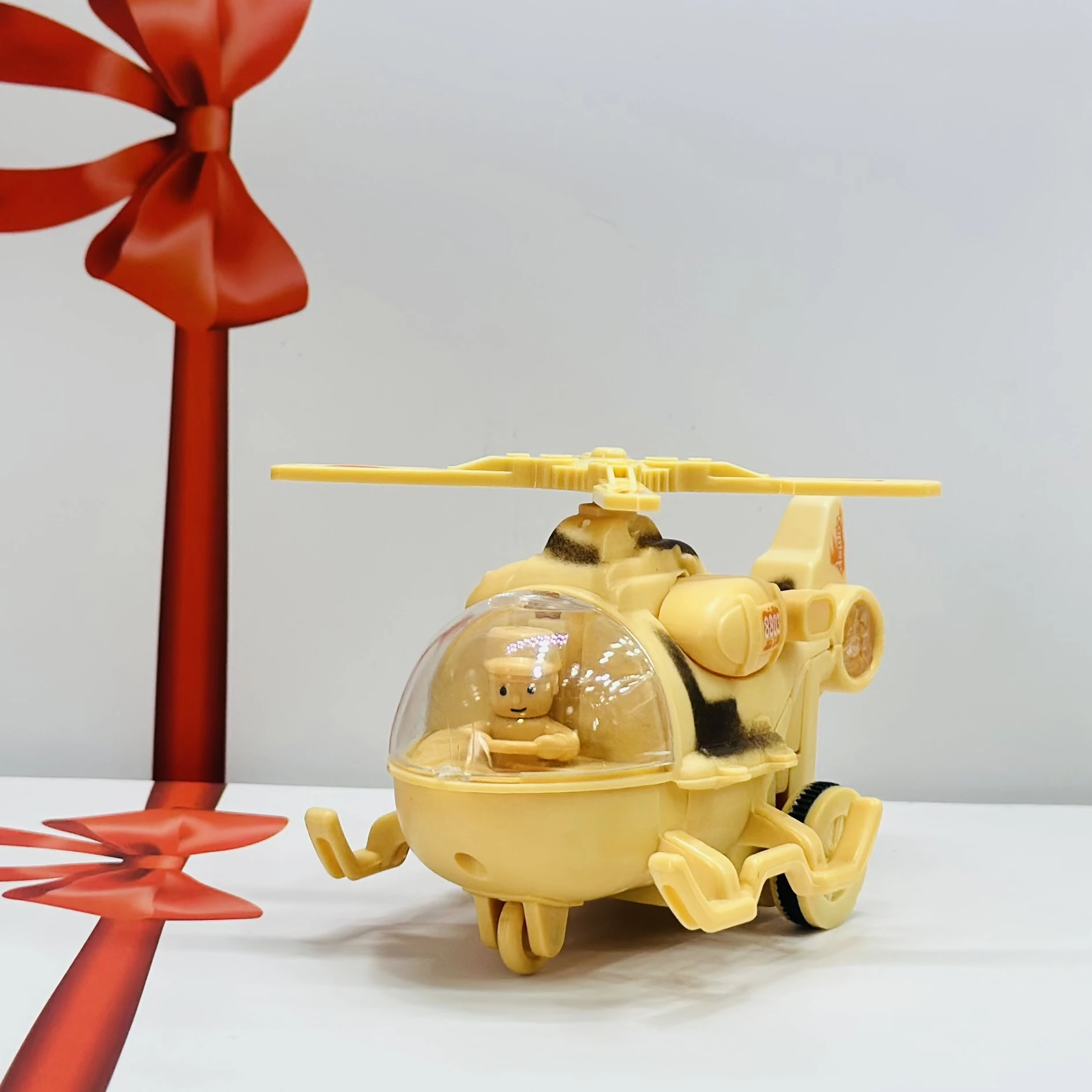 friction-powered toy helicopter