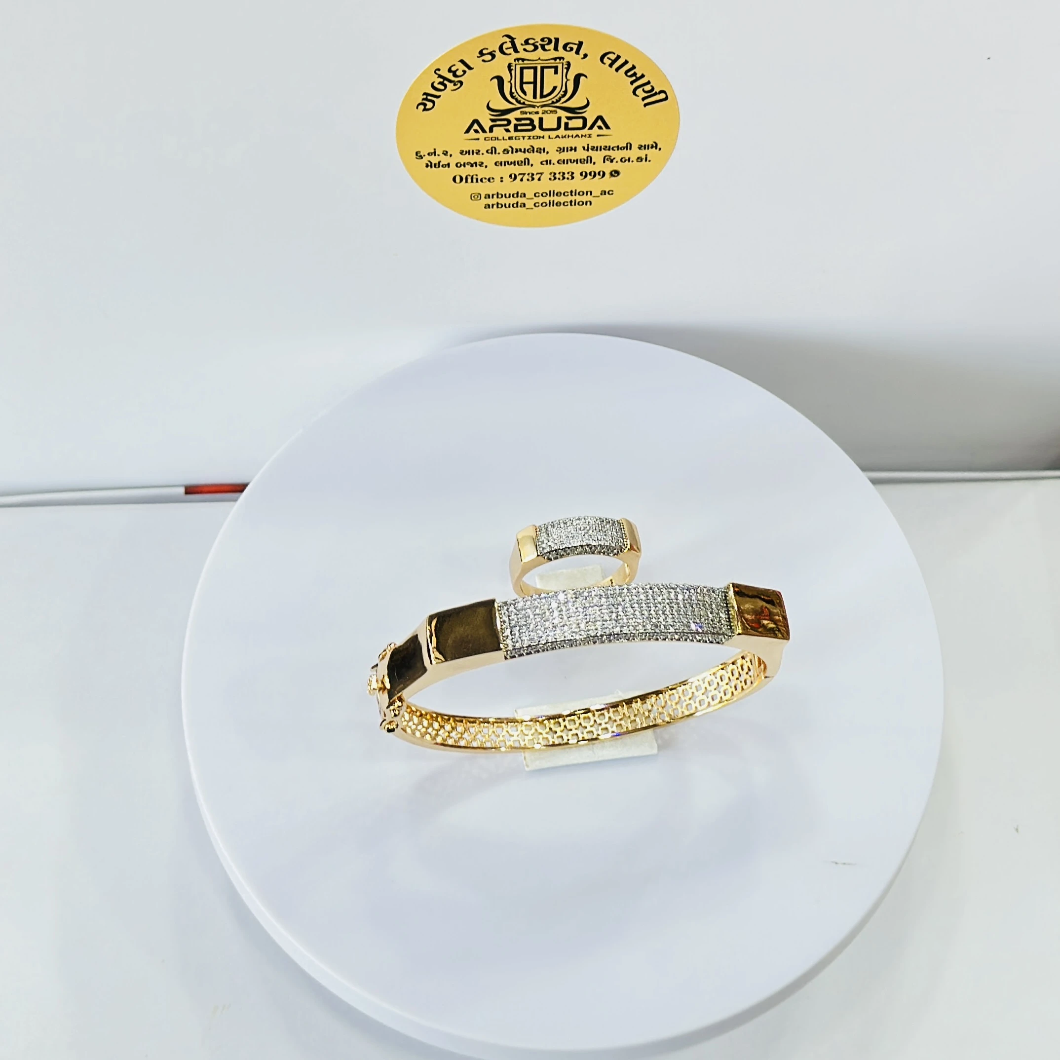 Gold toned Kada  and ring set