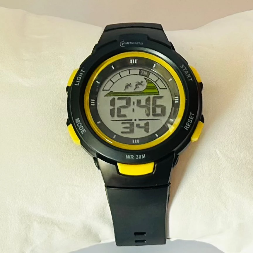 black Mingrui digital sports watch with a plastic or rubber strap.