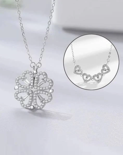 silver-toned, magnetic four-heart clover pendant necklace made of stainless steel