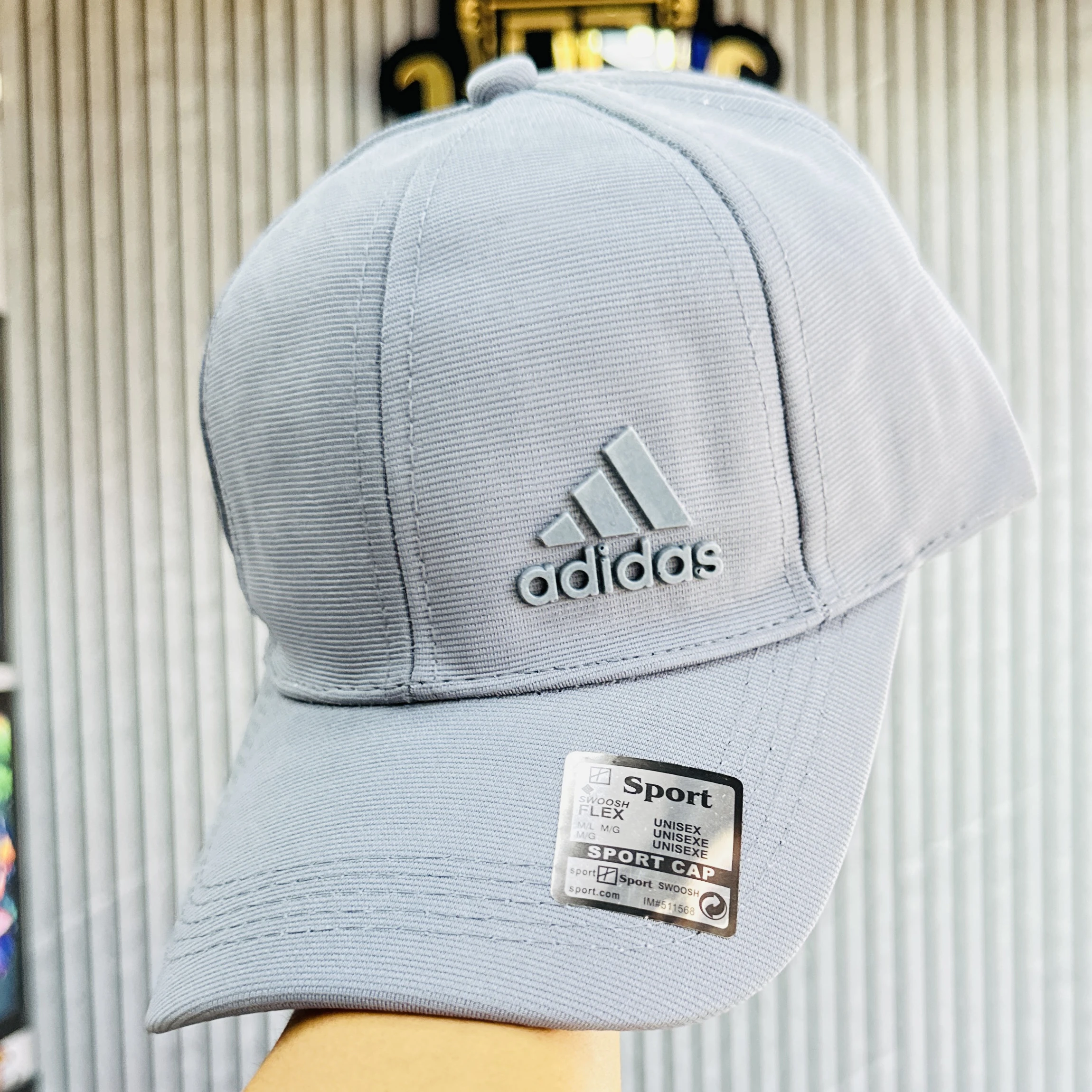 Adidas Men's Release Structured Stretch Fit Cap or similar model.
