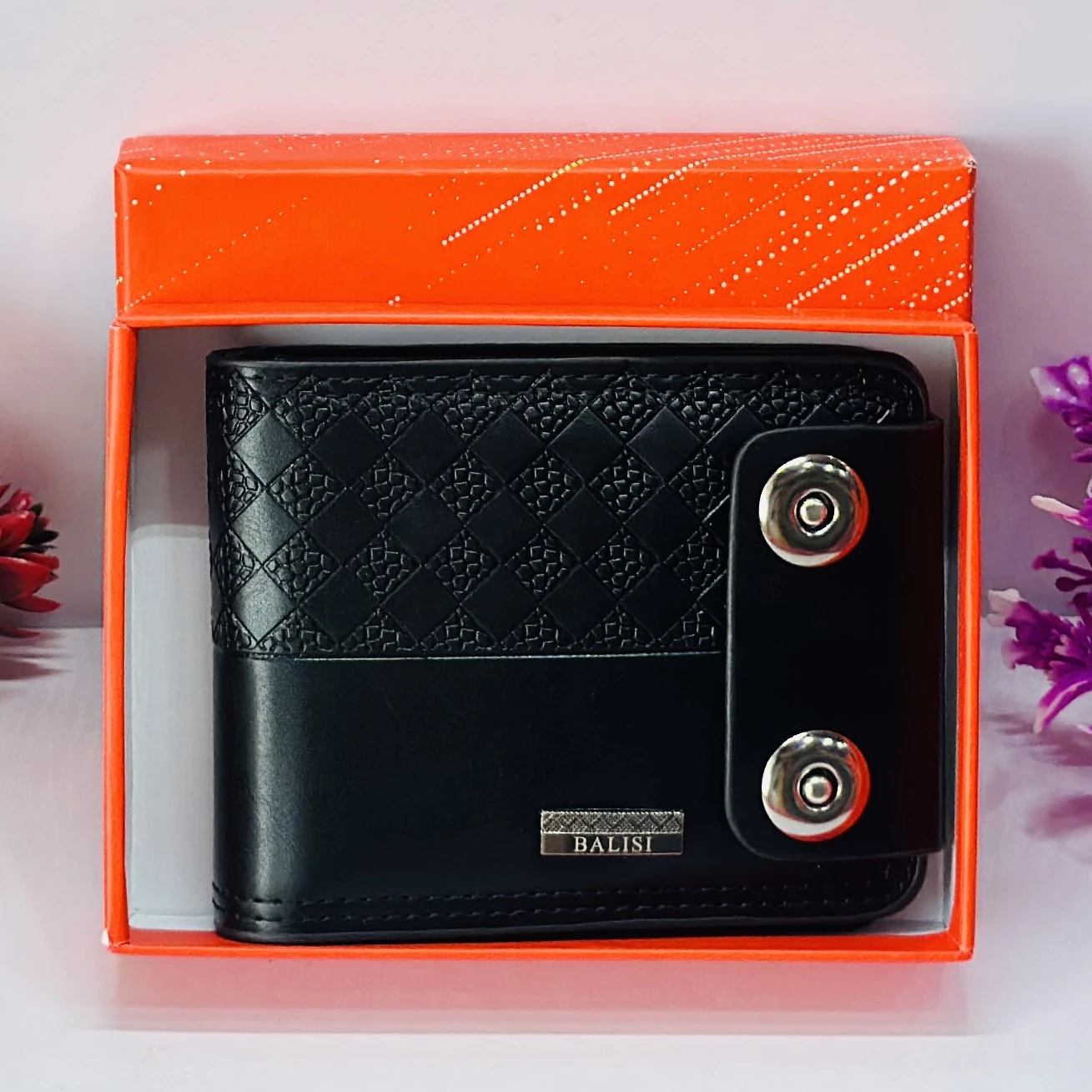 Black bi-fold men's wallet with a snap closure, branded as "Balisi".