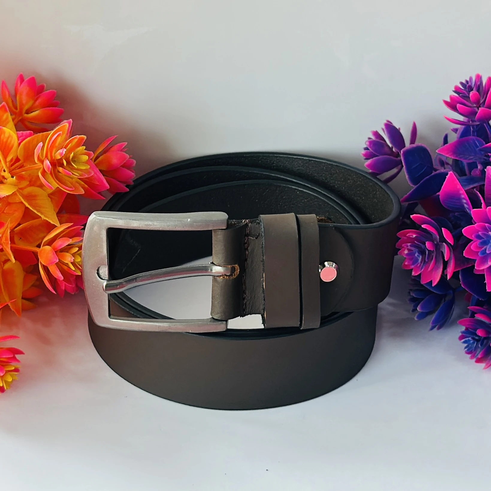 men's brown leather belt with a silver-tone buckle.