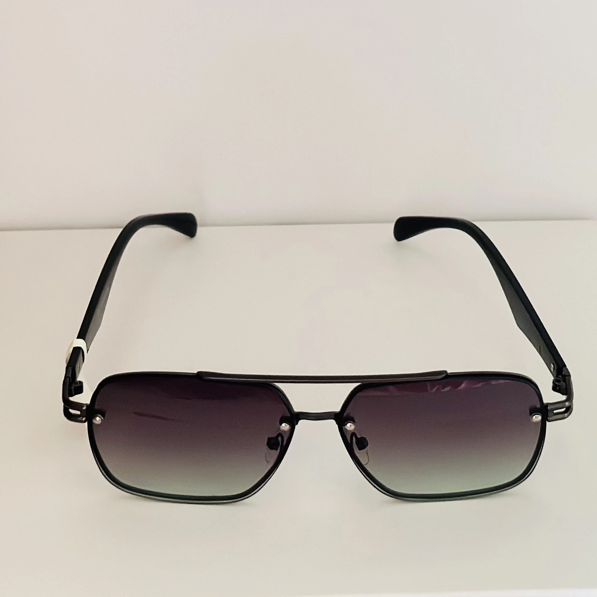 Ted Smith UV Protection Aviator sunglasses with a black metal frame and gradient lenses.
