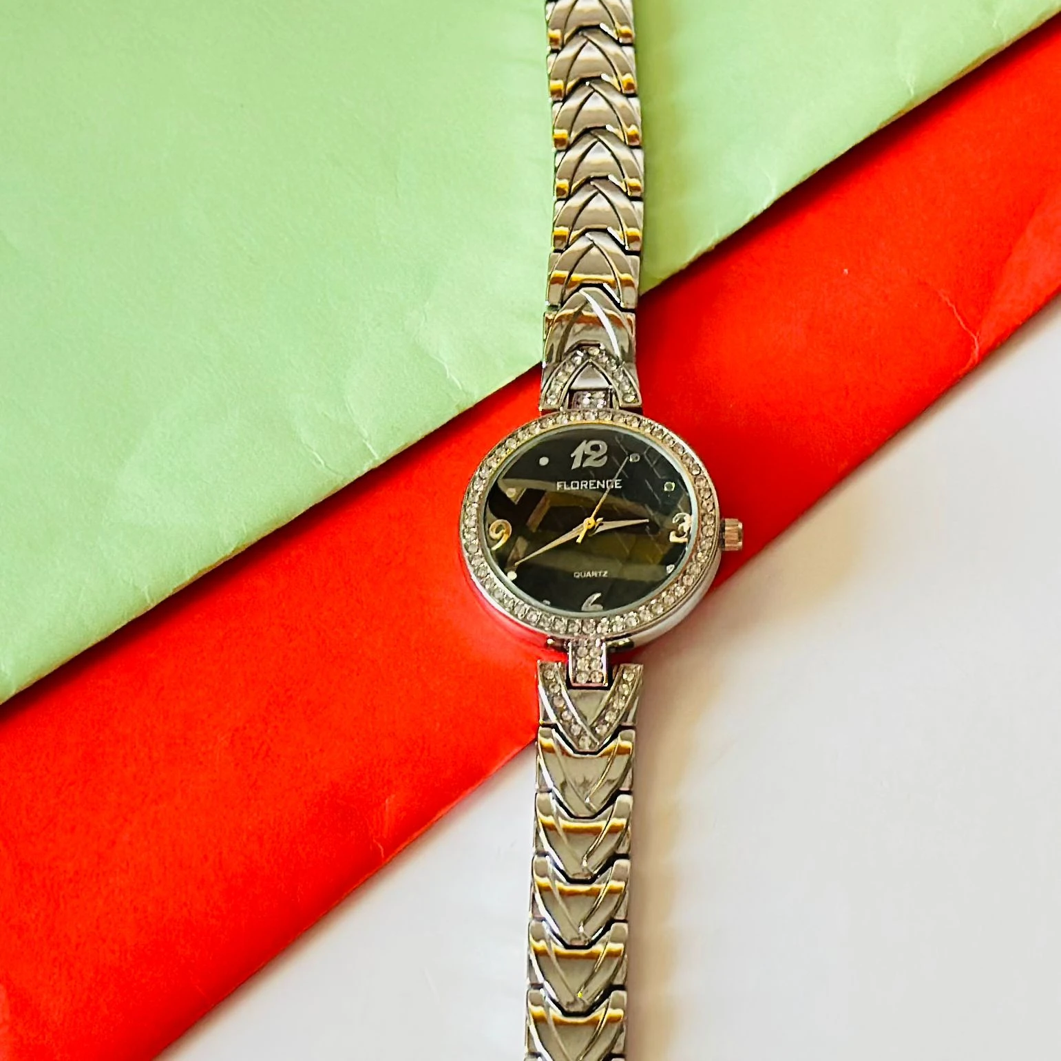 Florence quartz watch with a black dial and a two-tone stainless steel bracelet