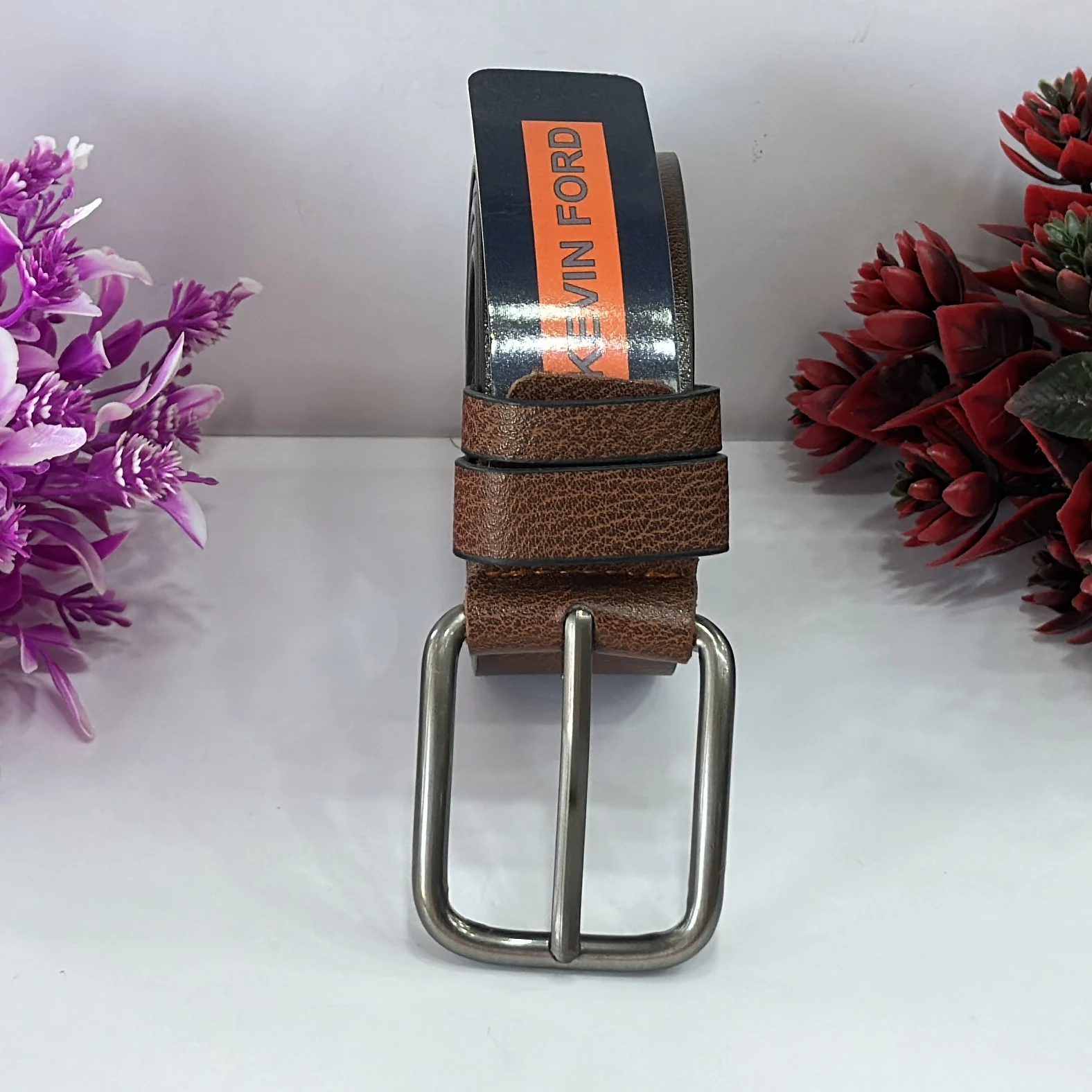 Brown textured leather or leatherette belt