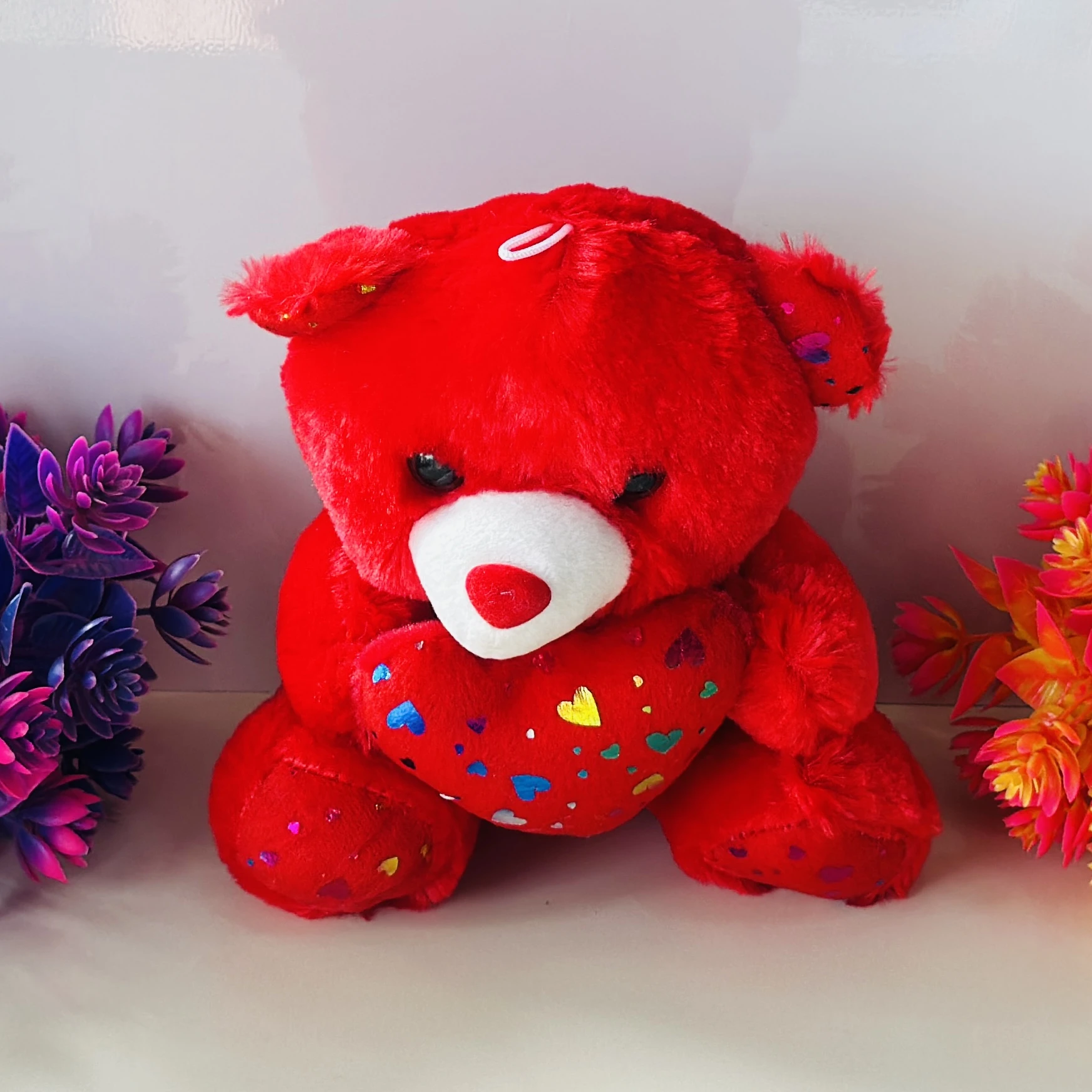 Red Lovely Teddy Sitting With Heart stuffed plush toy.