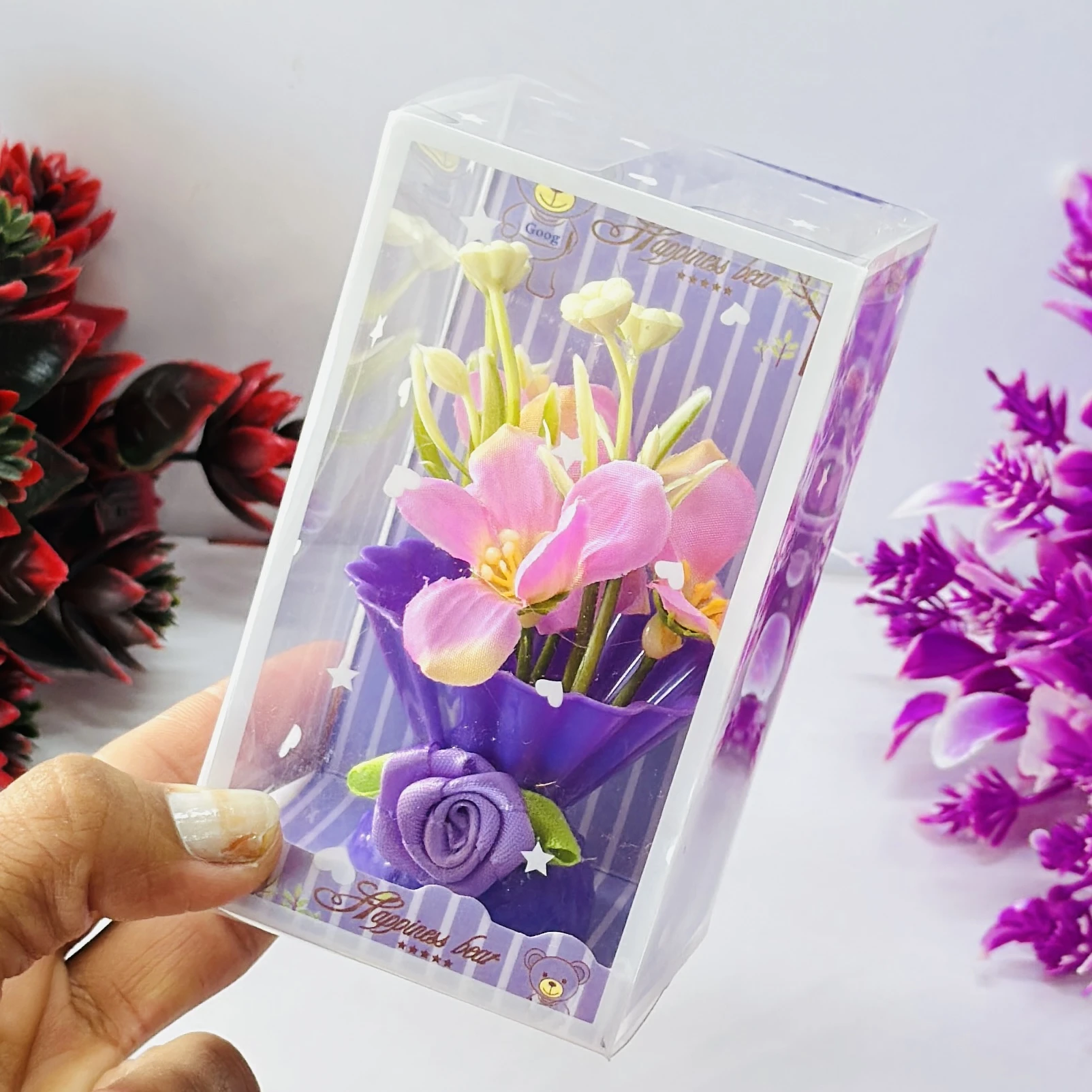 Tulip flower arrangement in a decorative gift box.