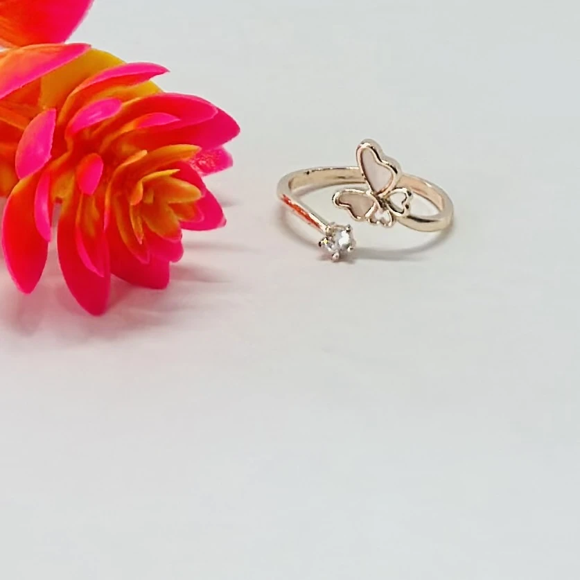 Rose gold-plated 925 sterling silver butterfly ring with a studded crystal.