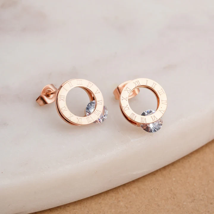 cubic zirconia rose gold titanium stud earrings.