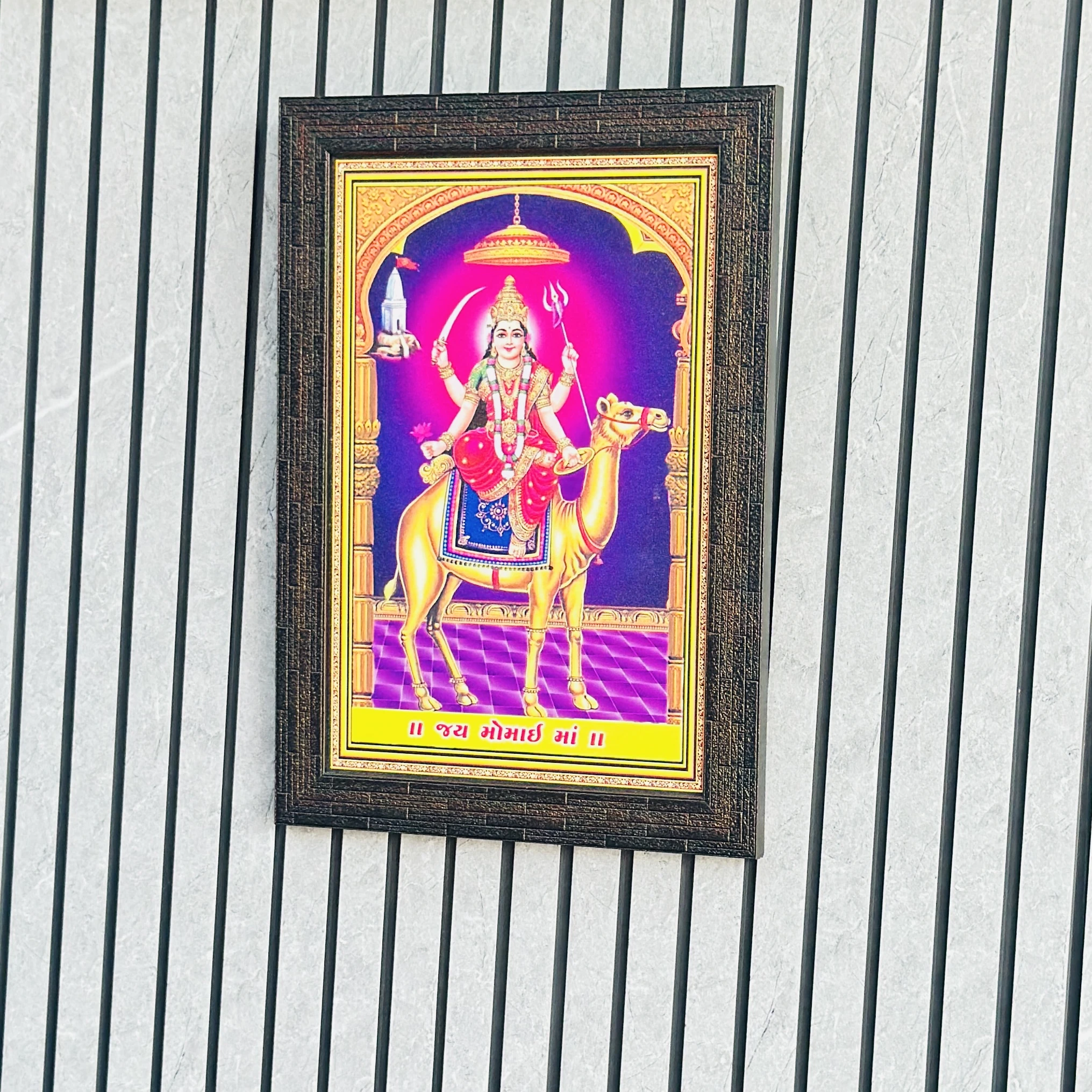 Goddess Momai Maa riding a camel