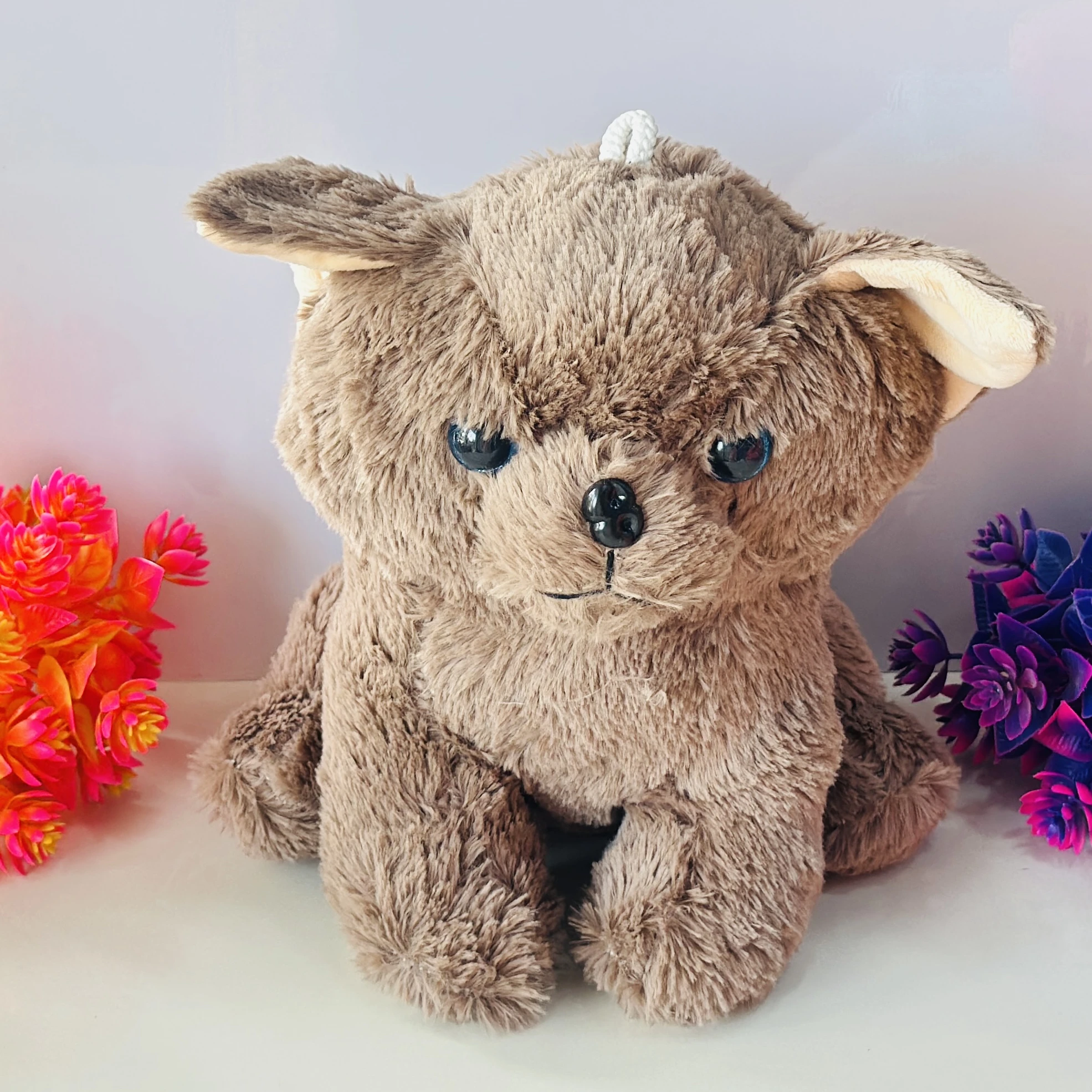 Brown fuzzy dog soft toy