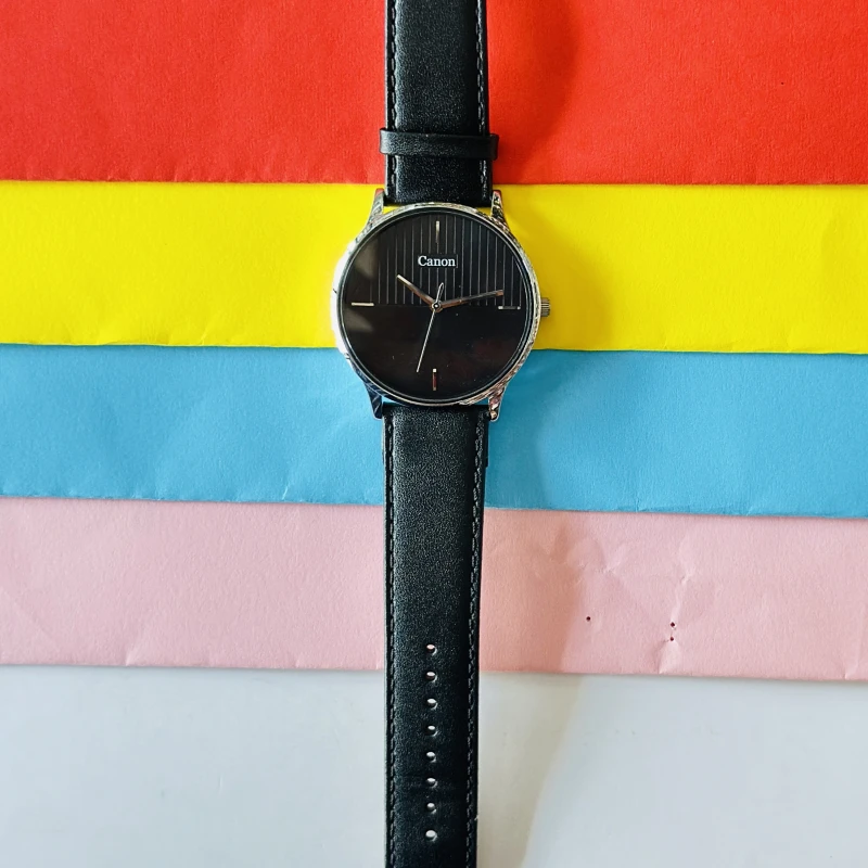 Quartz analogue watch for gents
