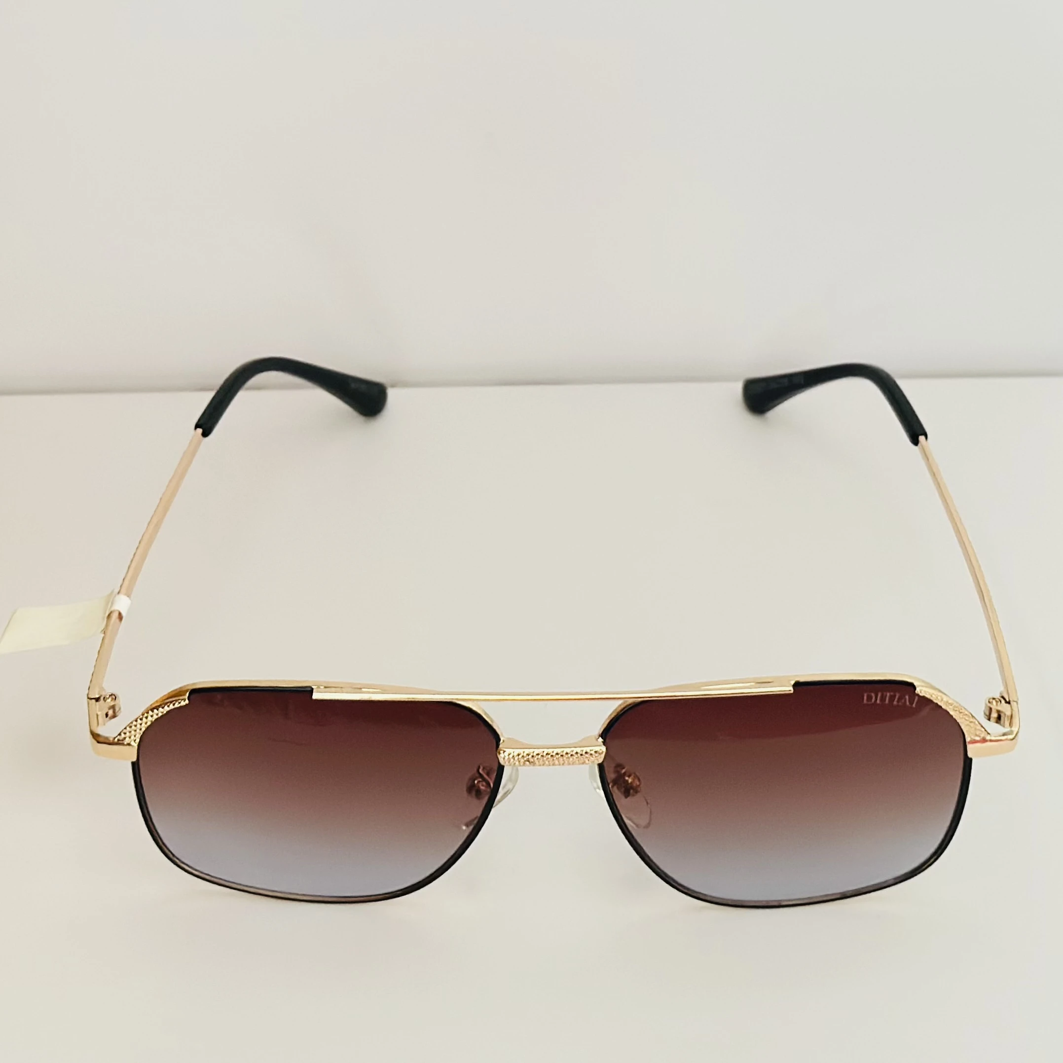Vincent Chase by Lenskart brown square sunglasses with a golden frame