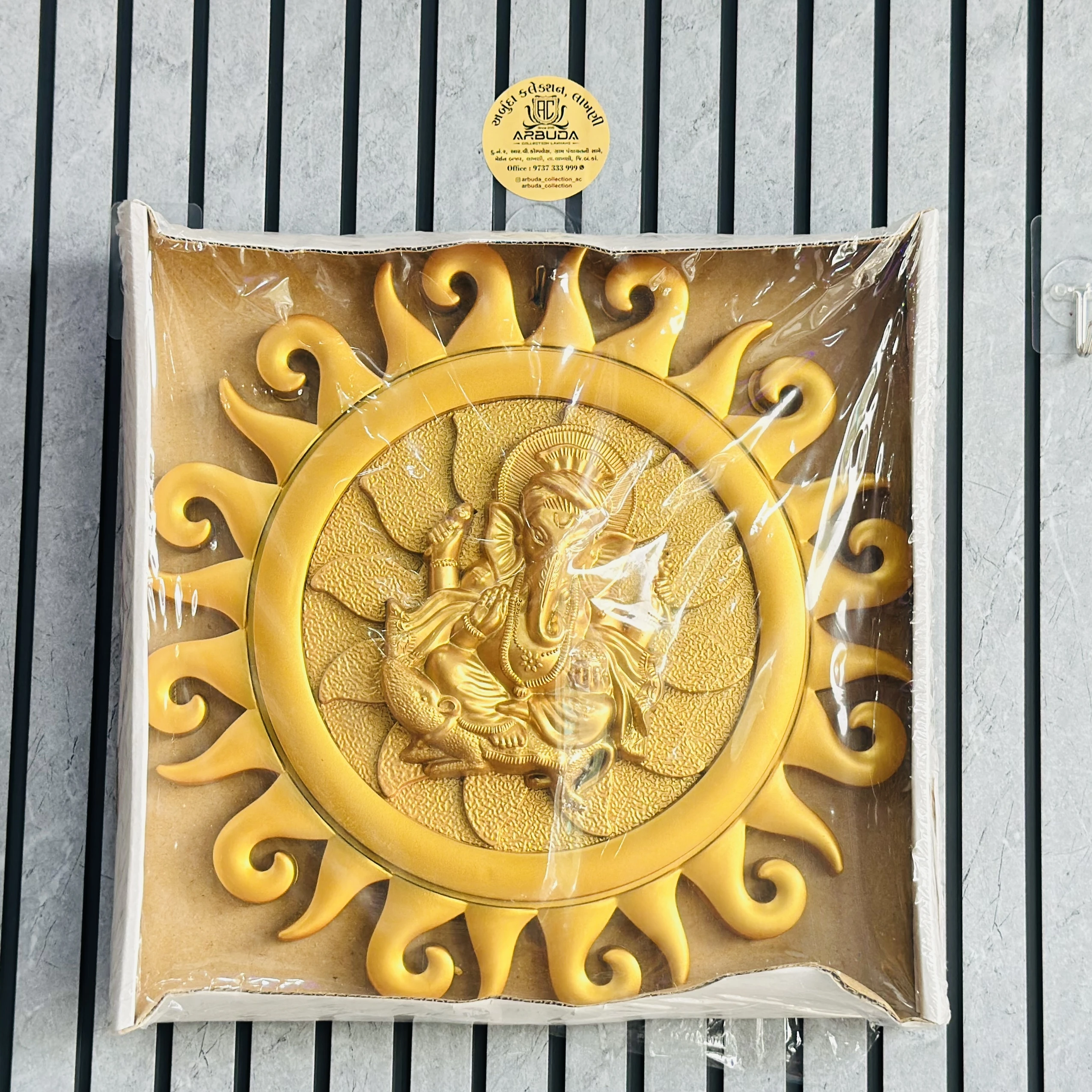 Lord Ganesha within a sun motif(SKU-DZKI90)