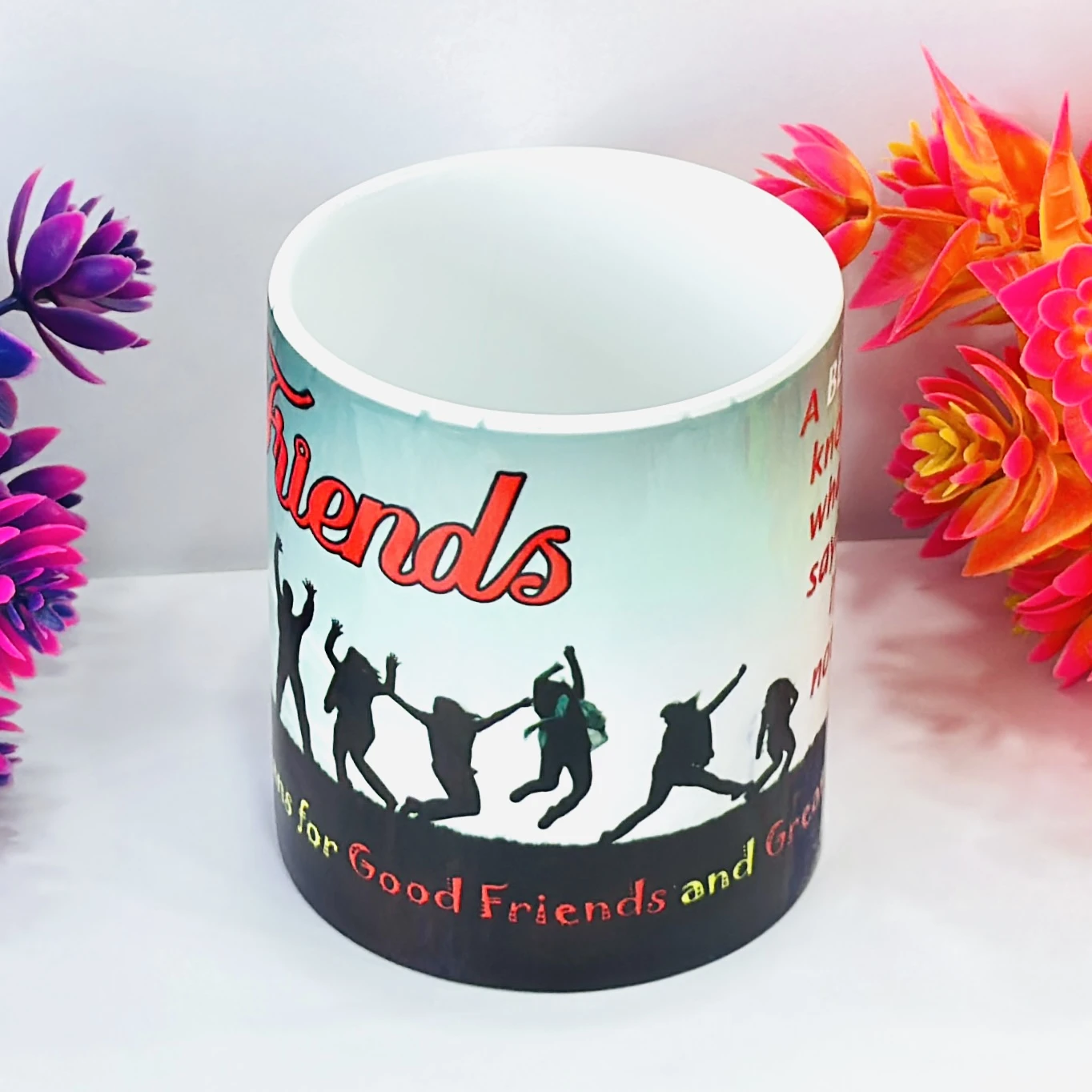 white ceramic coffee mug with a "Friends" theme design. ……XMKT8L