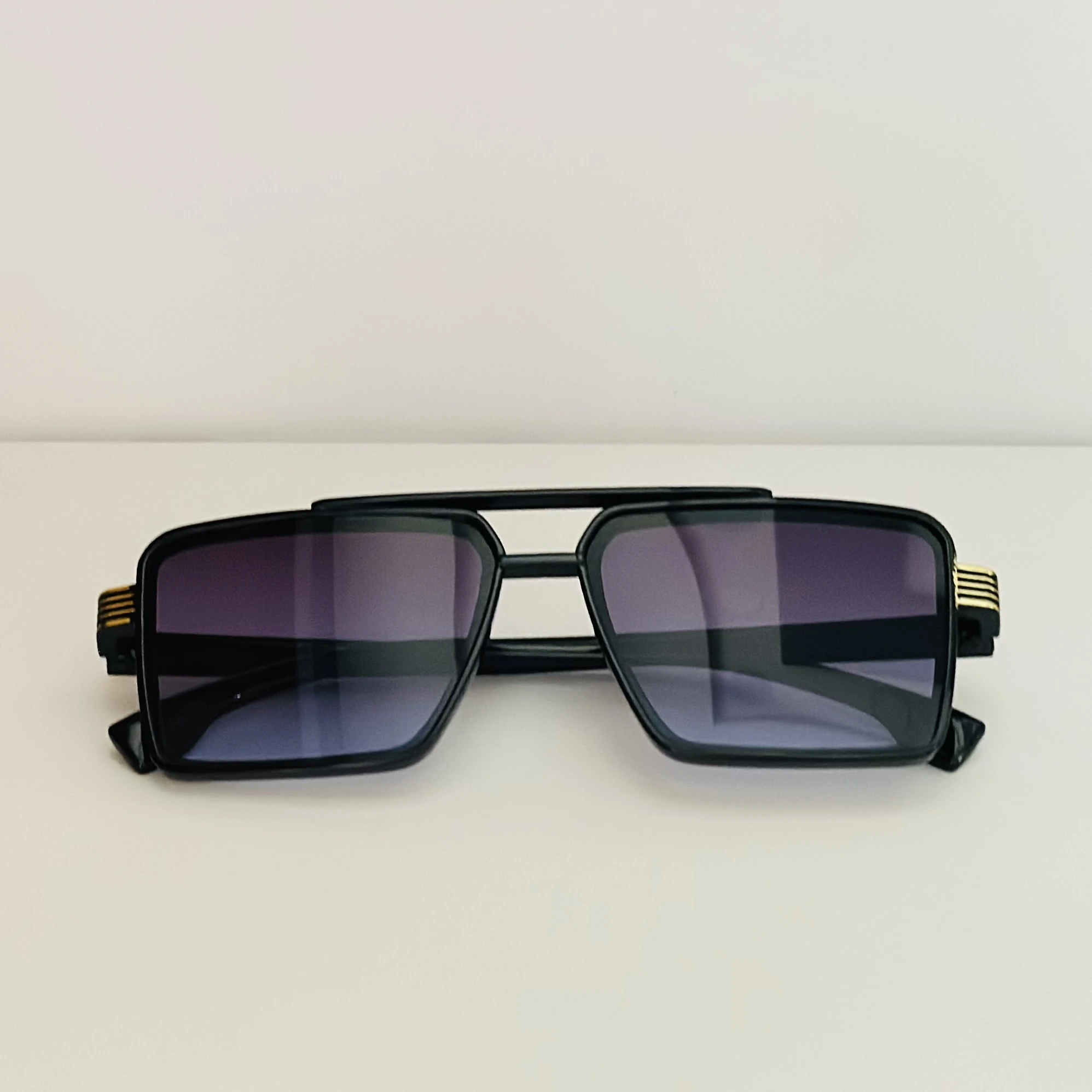 square sunglasses with a black frame