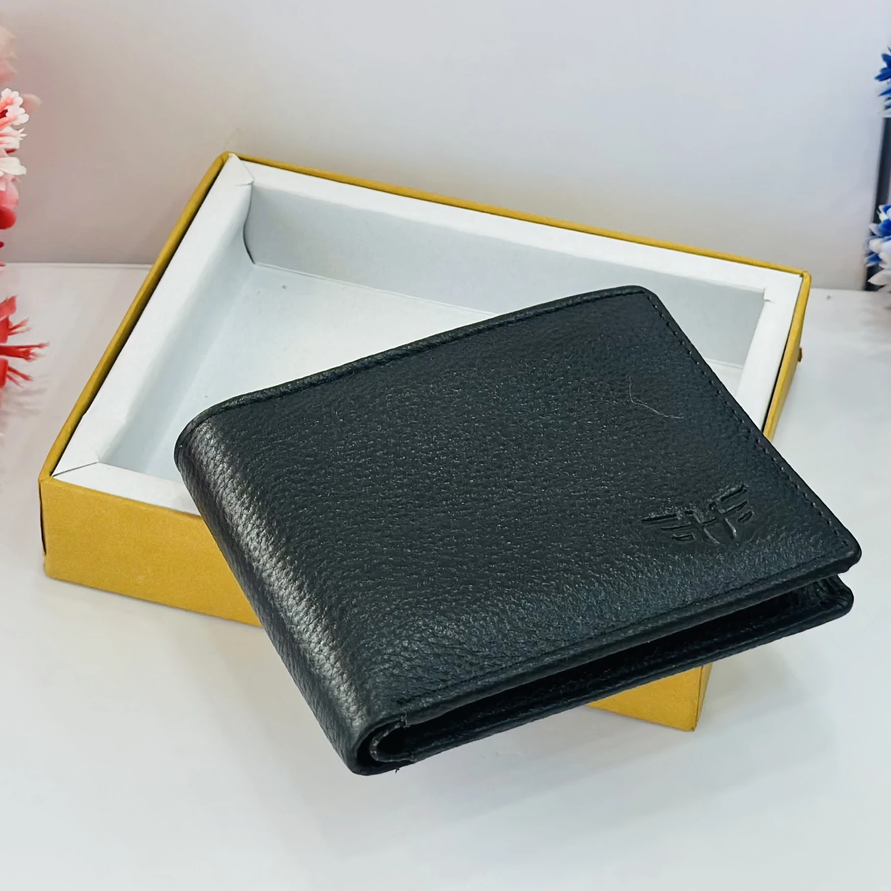 PUMA men's bi-fold leather wallet in black.