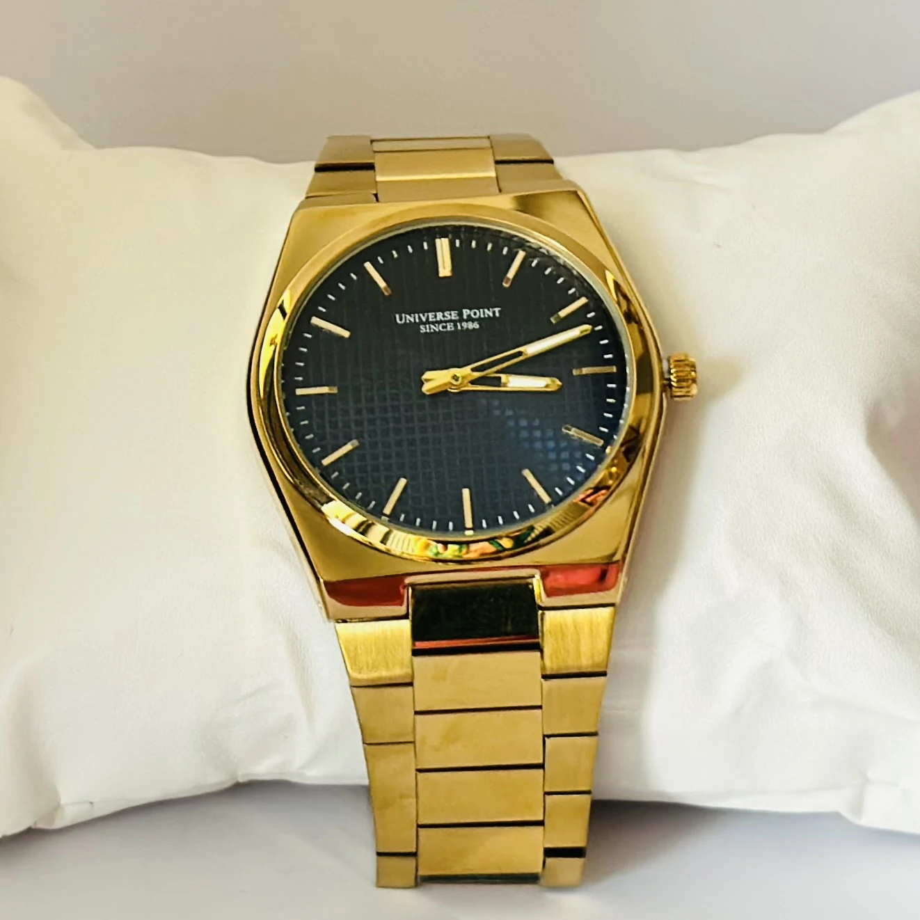 Analog Watch with a golden dial and stainless steel strap