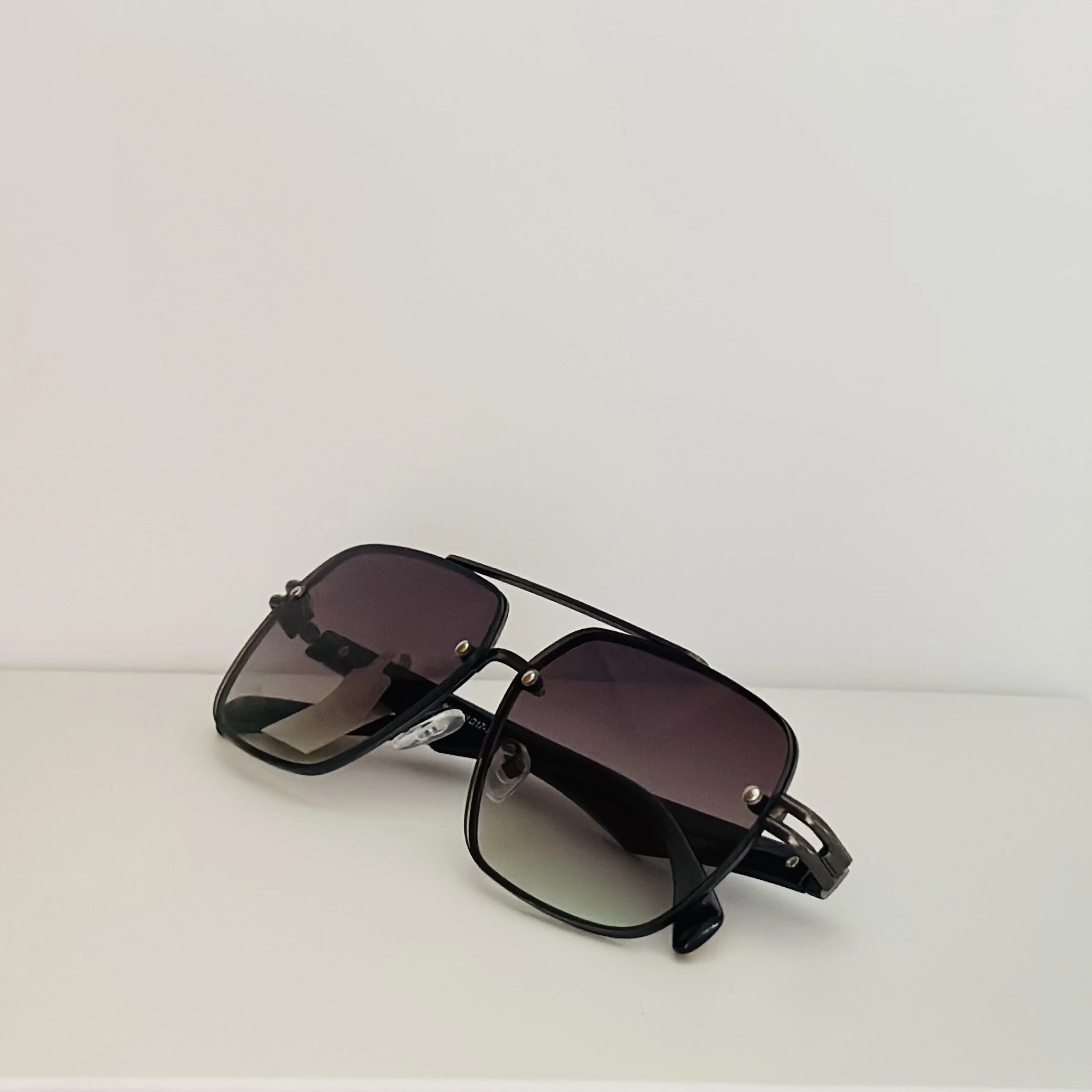 Ted Smith UV Protection Aviator sunglasses with a black metal frame and gradient lenses.