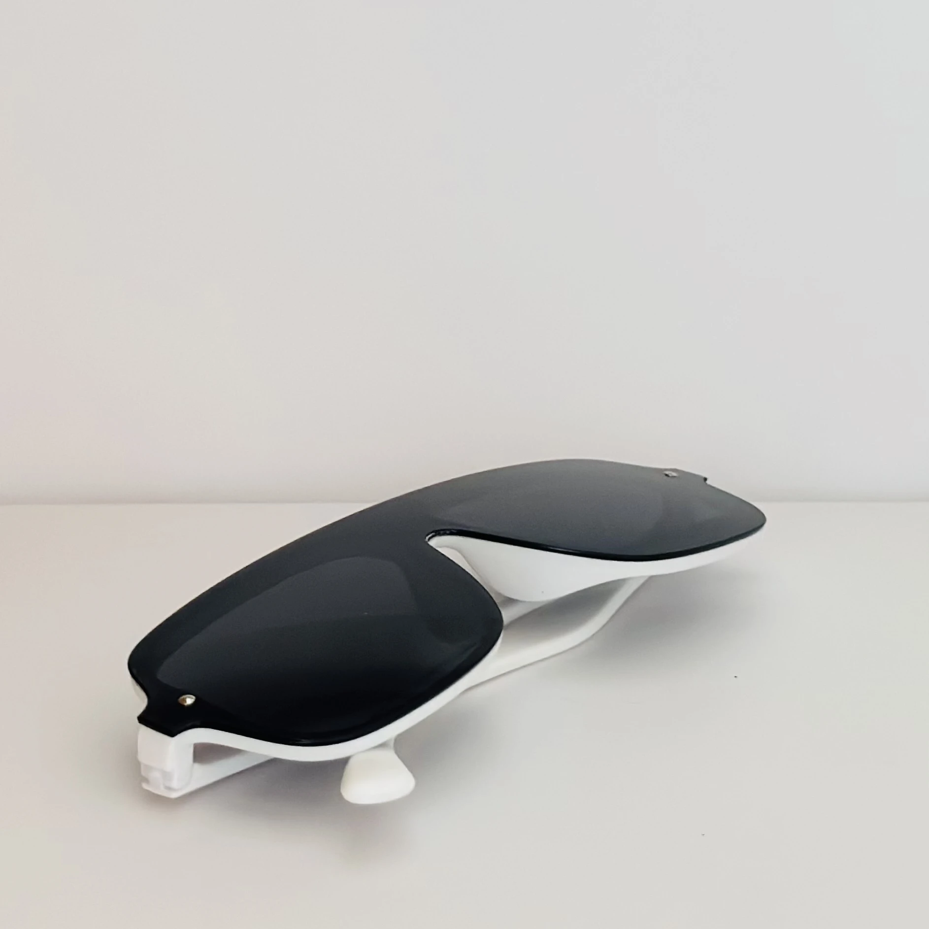 Gucci GG0255S fashion pilot sunglasses in black and ivory acetate with grey lenses.