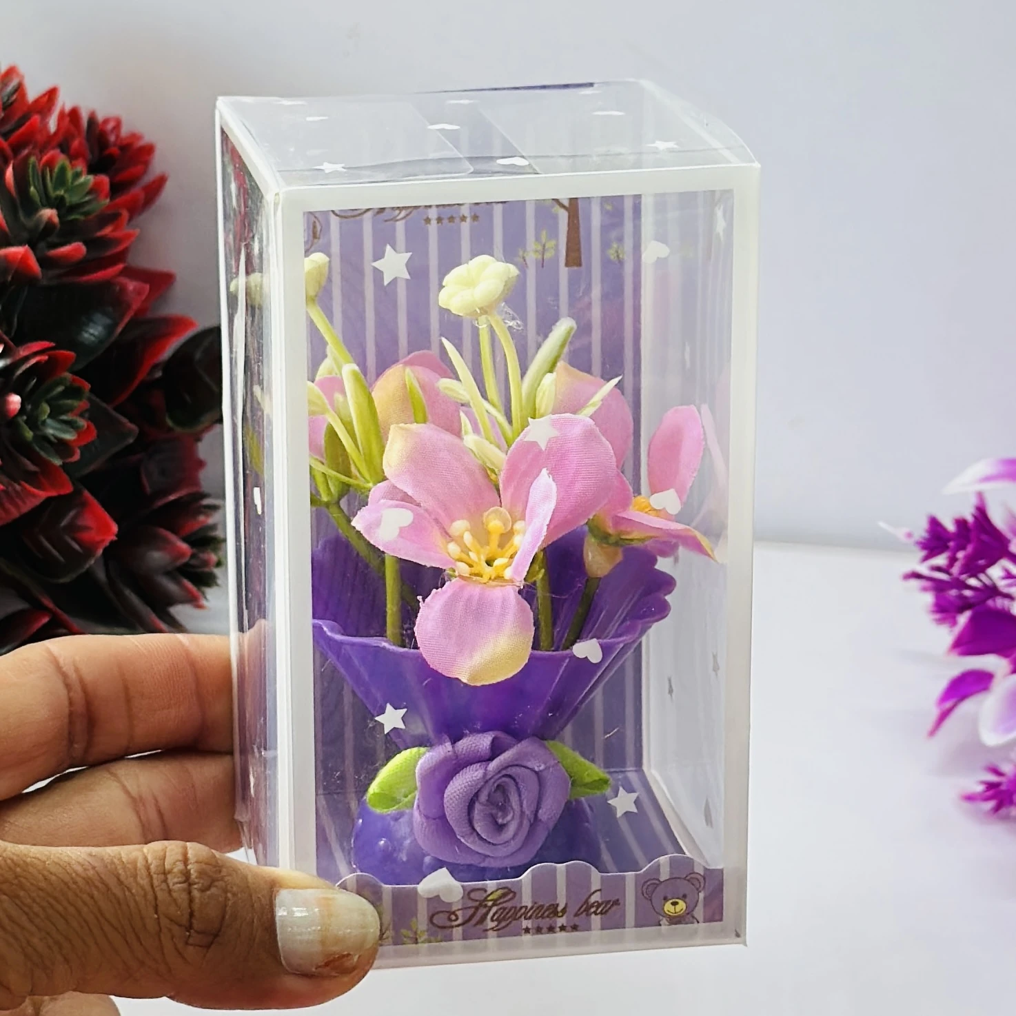 Tulip flower arrangement in a decorative gift box.
