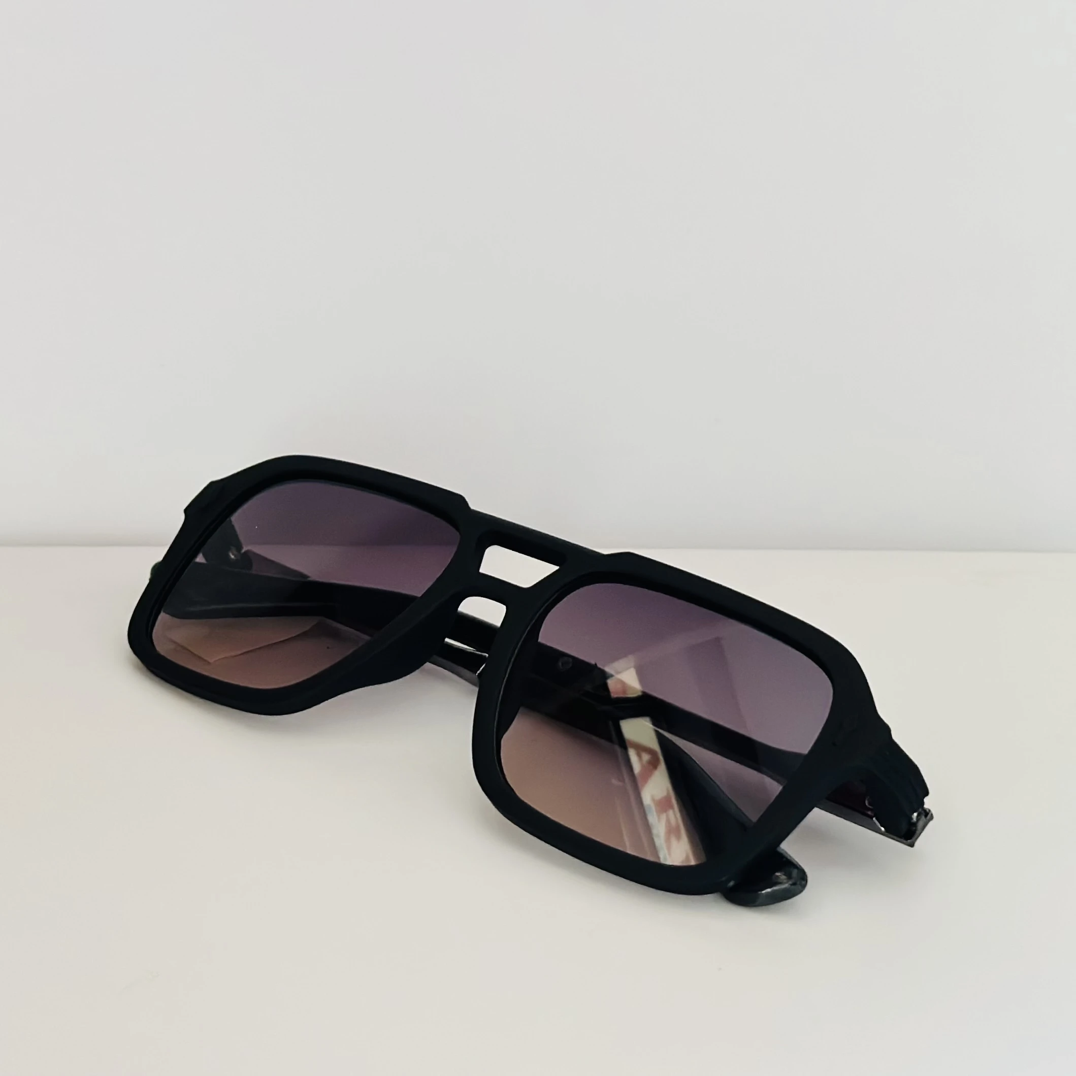 black Carrera 317/S navigator sunglasses with grey gradient lenses.