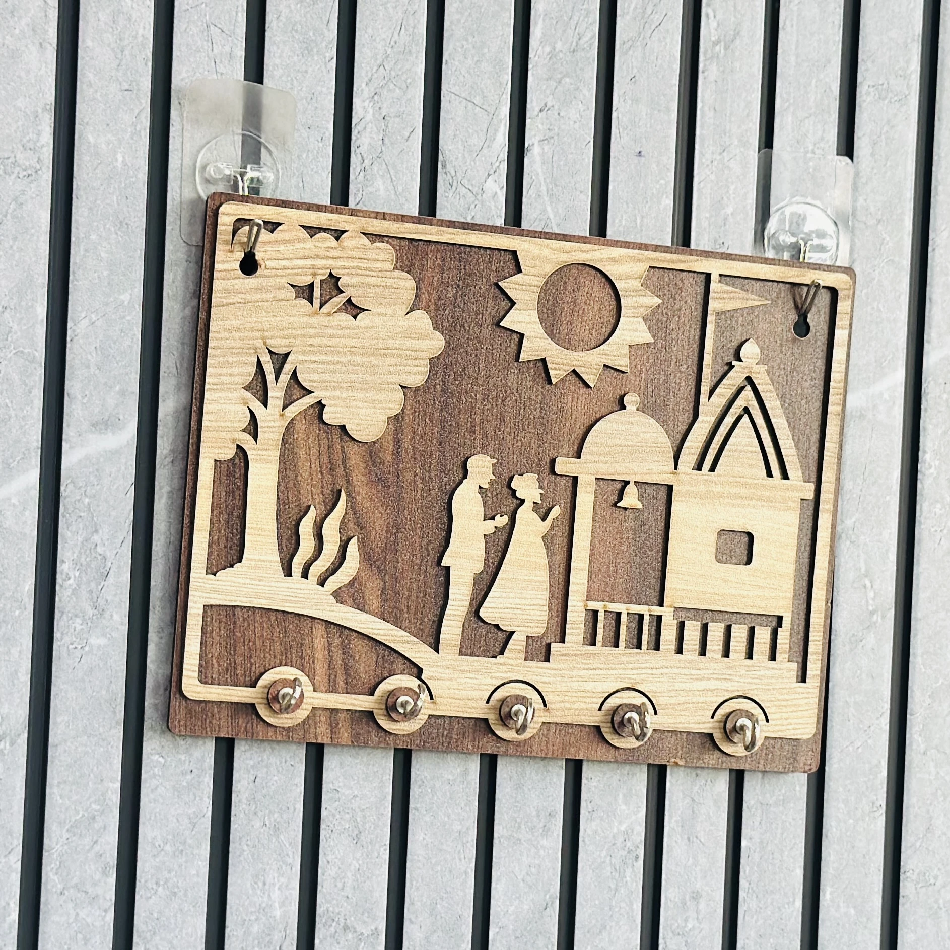 Wooden key holder with a decorative design(SKU-9XQ2BZ)