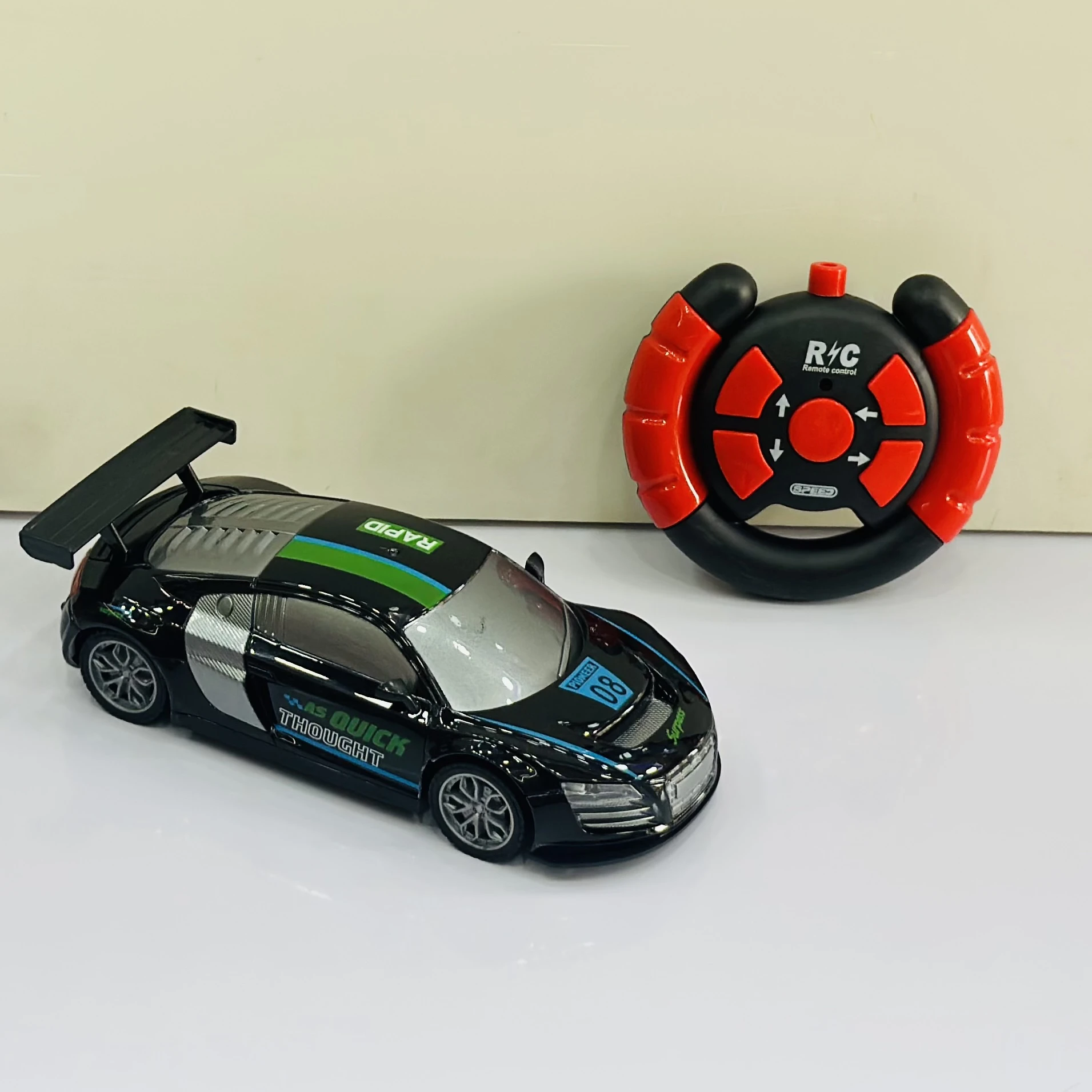 Firerace Championship" 1:18 scale remote-control (R/C) toy car.