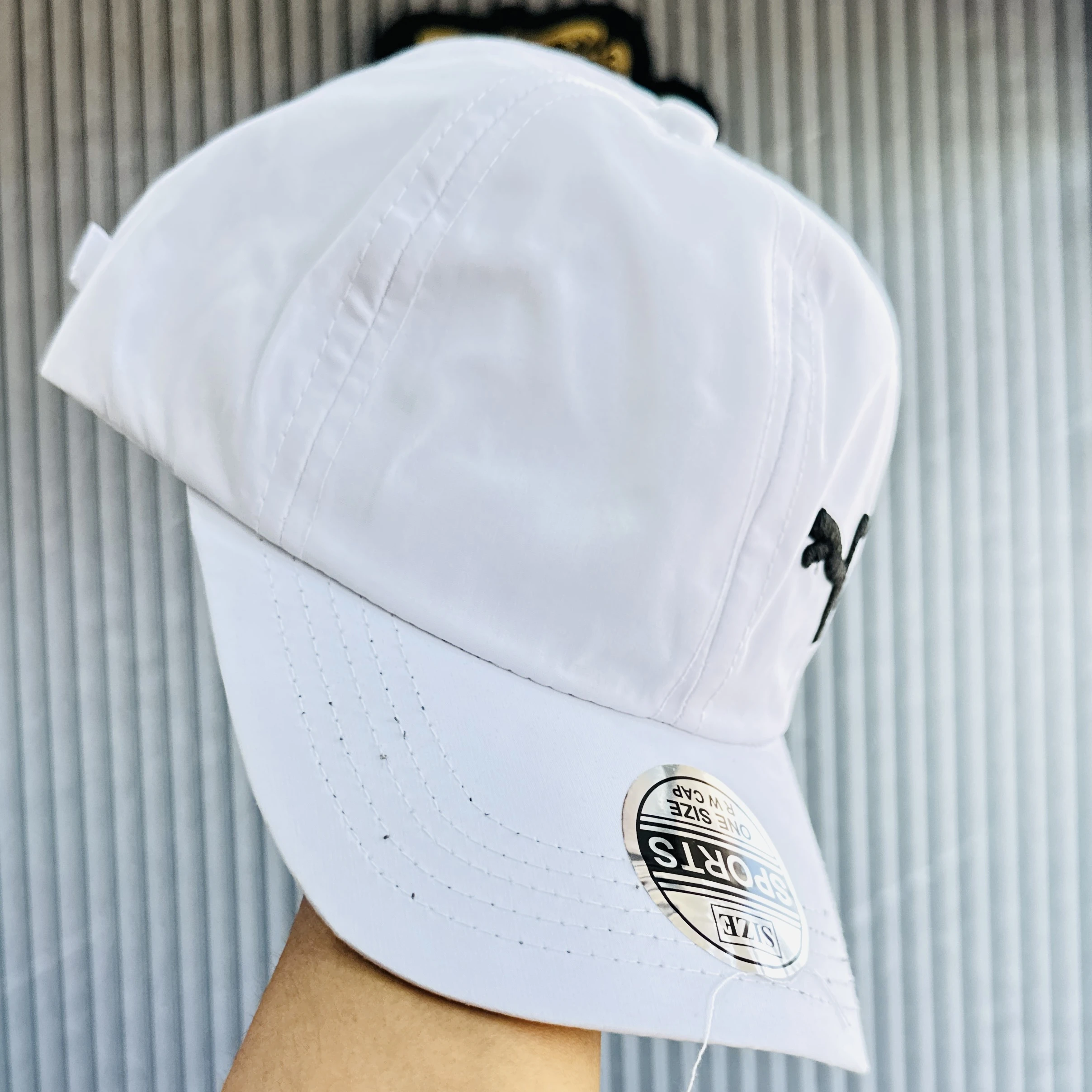 white baseball cap