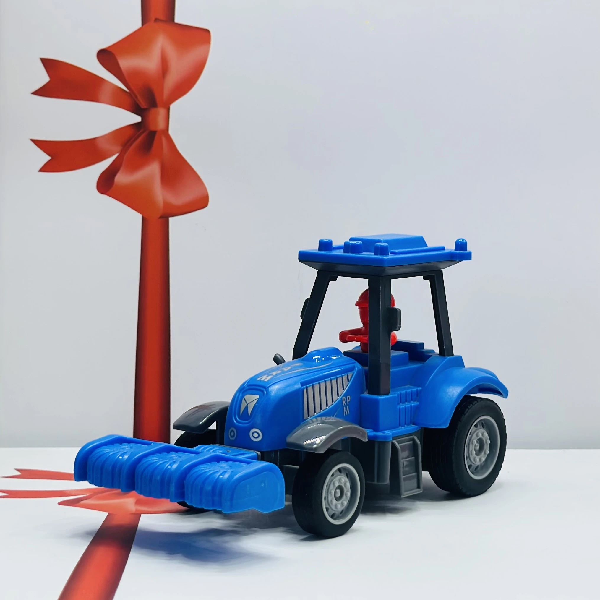 Blue plastic toy tractor