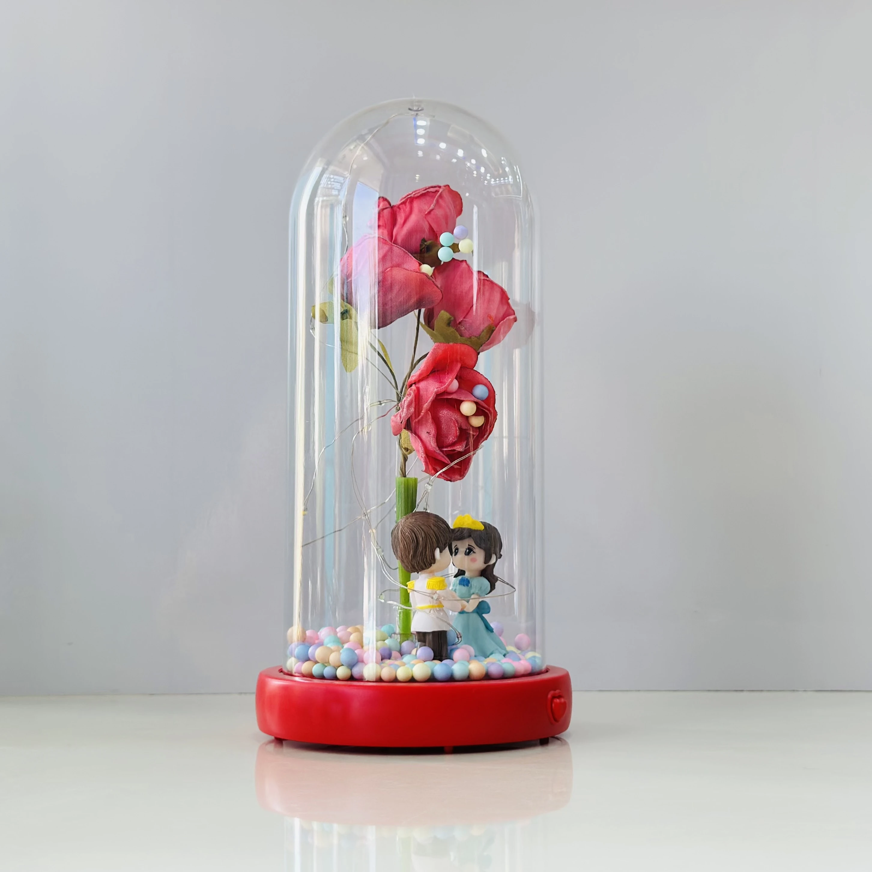 ROMANTIC RED ROSE COUPLE SHOWPIECE IN GLASS DOME WITH LIGHT, MUSIC & BLUETOOTH (SKU-58672S)