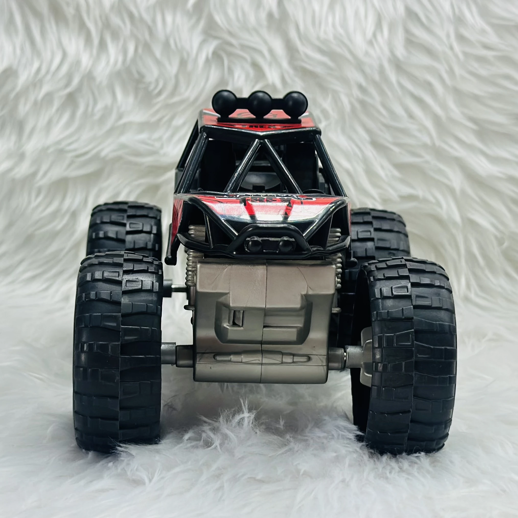Red "Dino Off-Road" toy monster truck