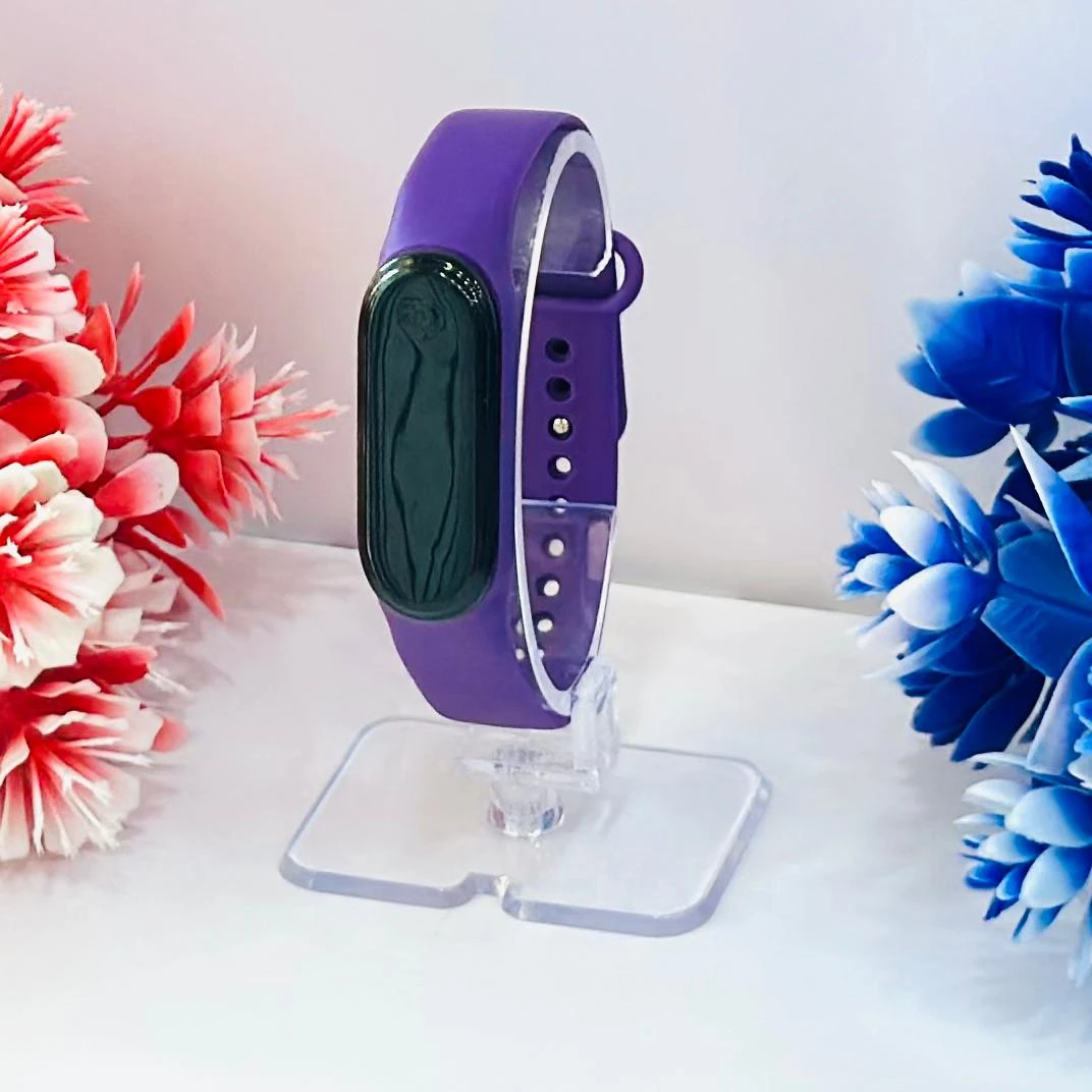 appears to be an Aquarius AQ112 fitness tracker in purple.
