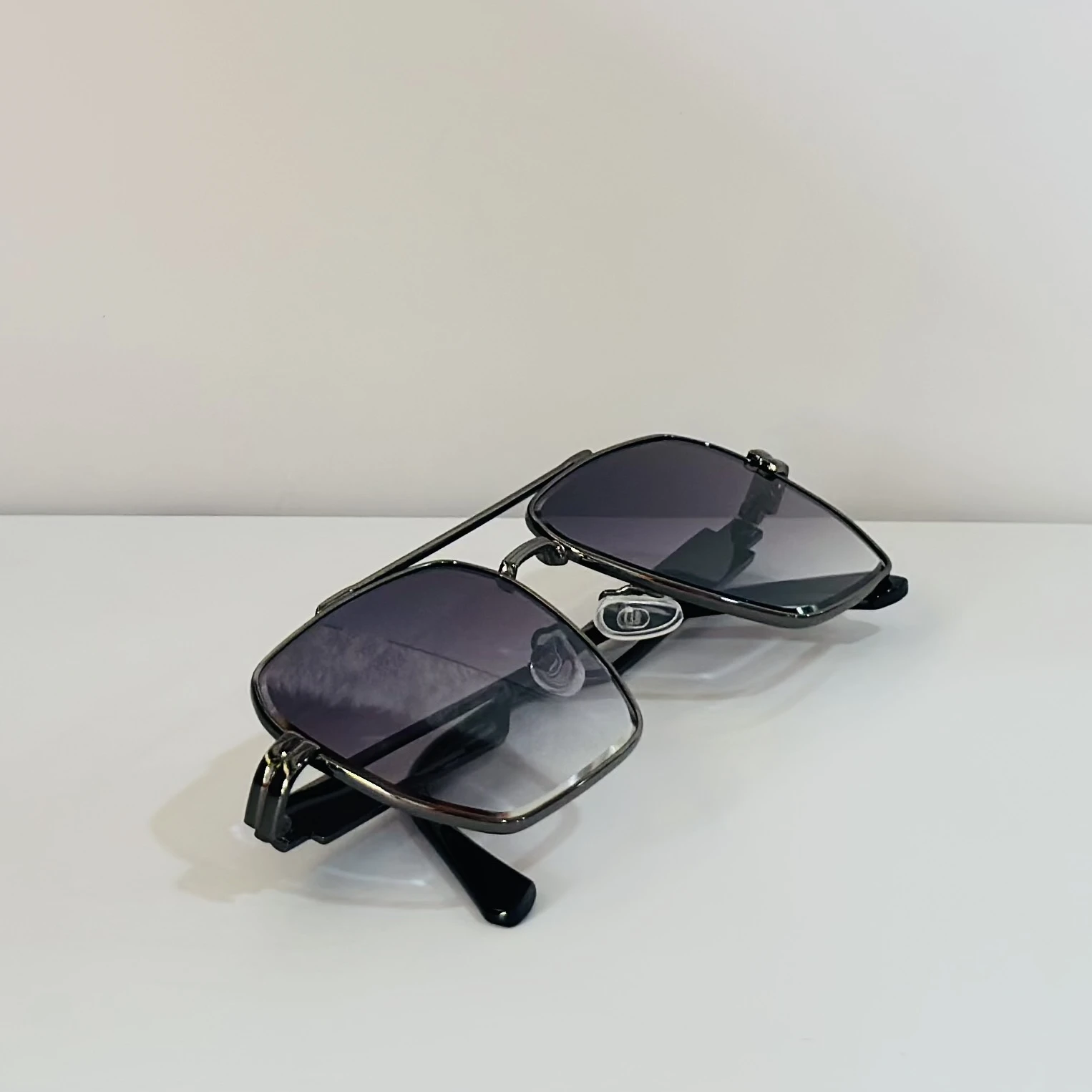 pair of Voyage unisex grey frame purple lens color wayfarer sunglasses.