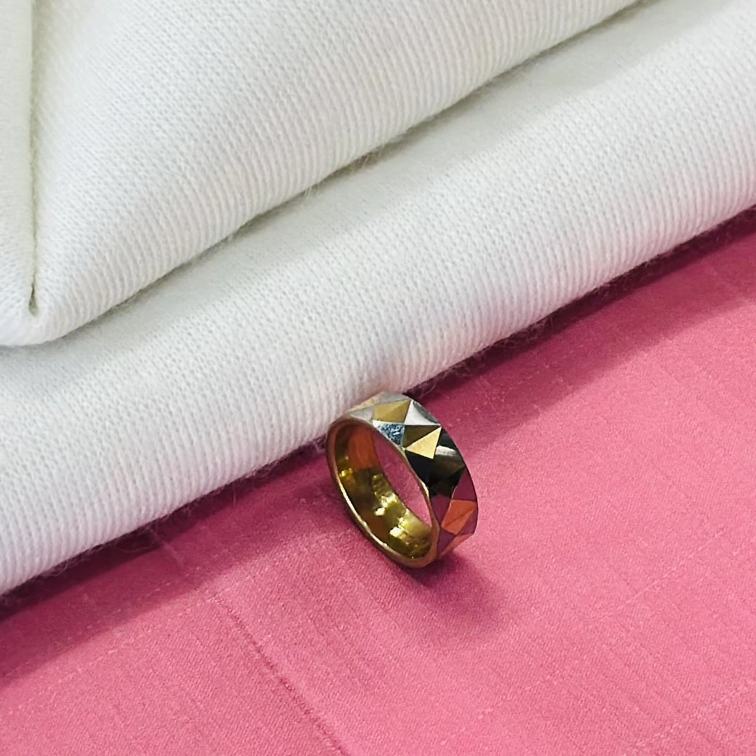 Tungsten carbide yellow faceted domed pyramid pattern wedding band ring.
