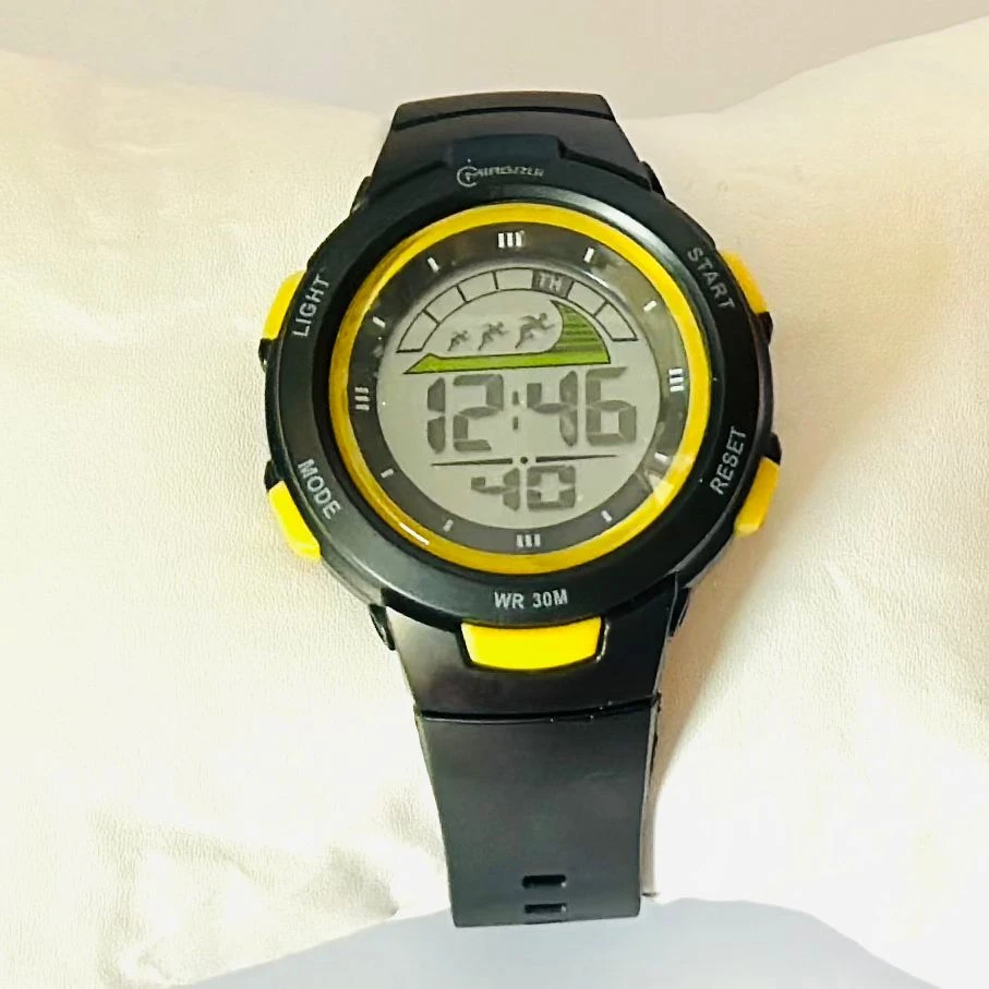 black Mingrui digital sports watch with a plastic or rubber strap.