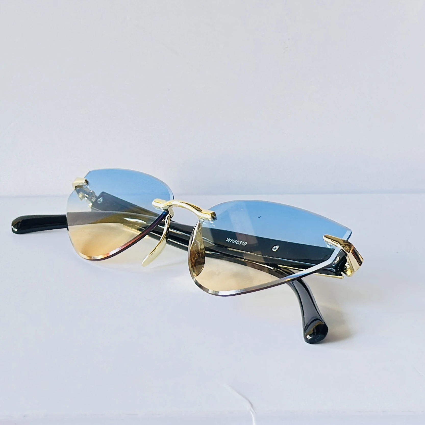 Rimless cat-eye sunglasses