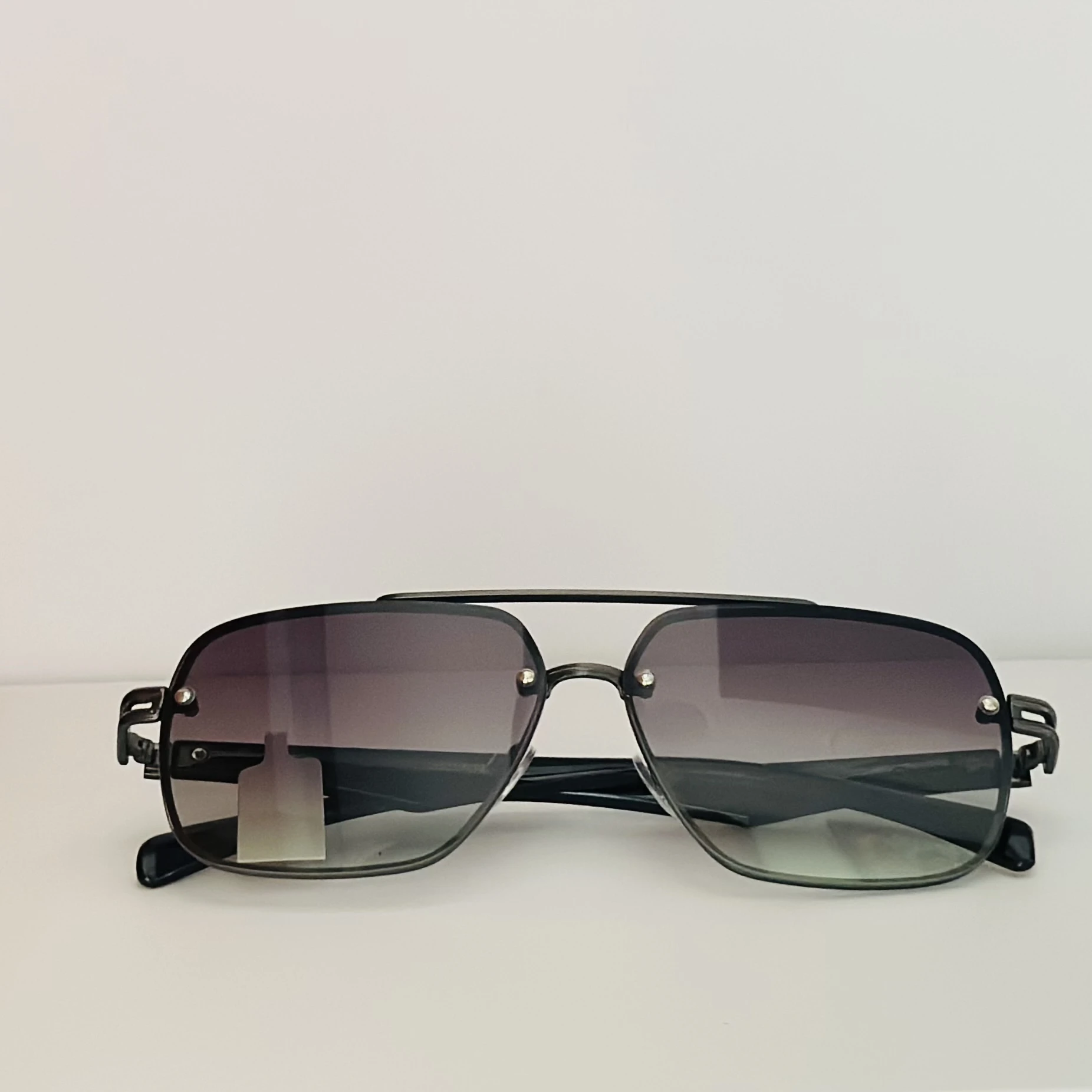 Ted Smith UV Protection Aviator sunglasses with a black metal frame and gradient lenses.